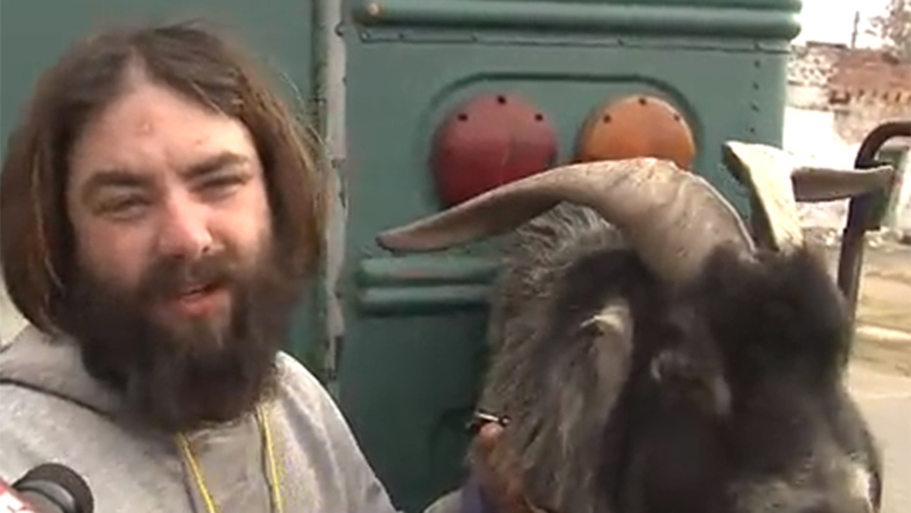 Erick Brown and his service goat, Deer, were kicked off a Detroit bus.