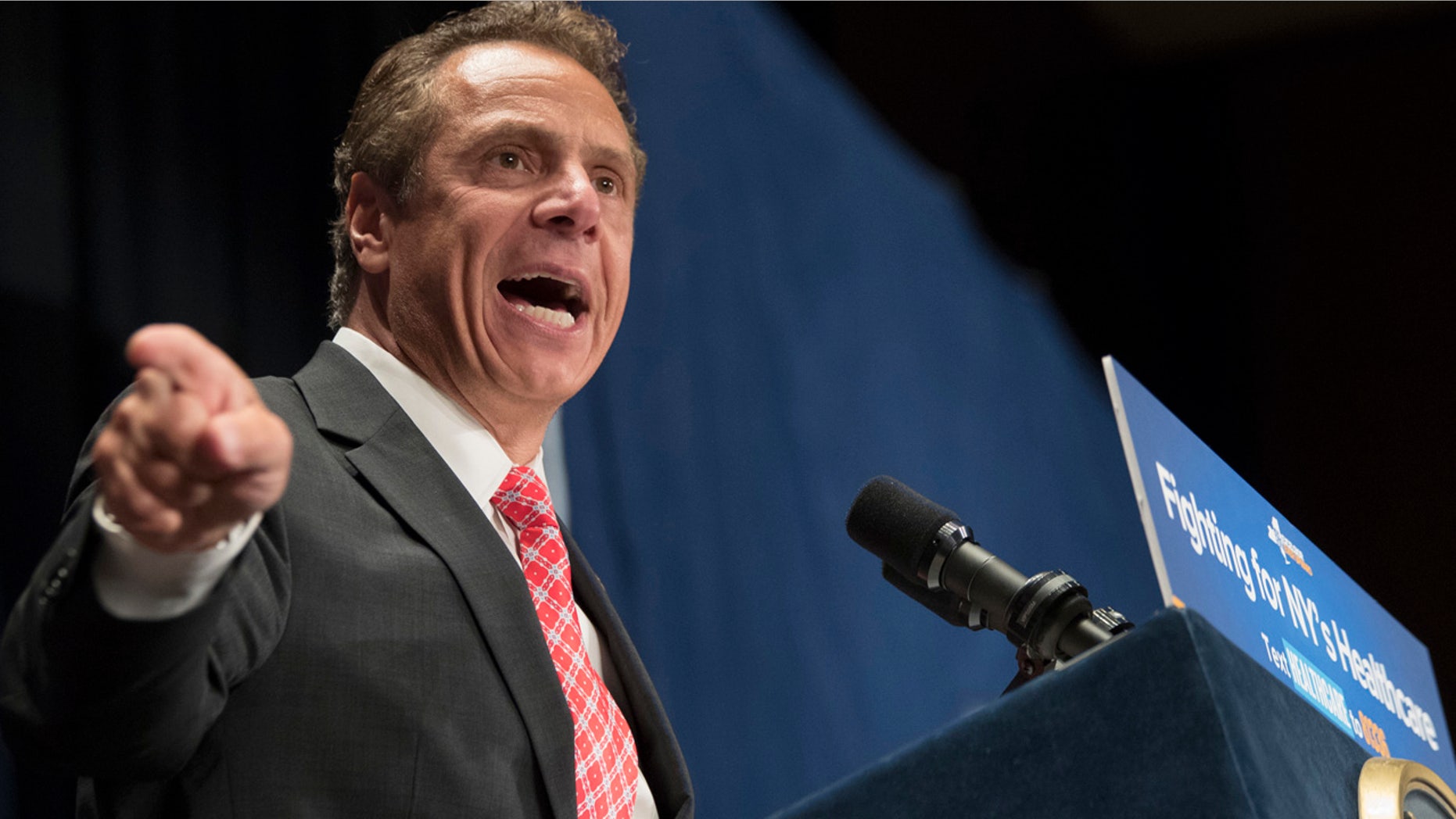 JULY 2017: Gov. Andrew Cuomo speaks during a rally in New York. He faces a tense primary challenge this year against 'Sex and the City'' star Cythia Nixon.