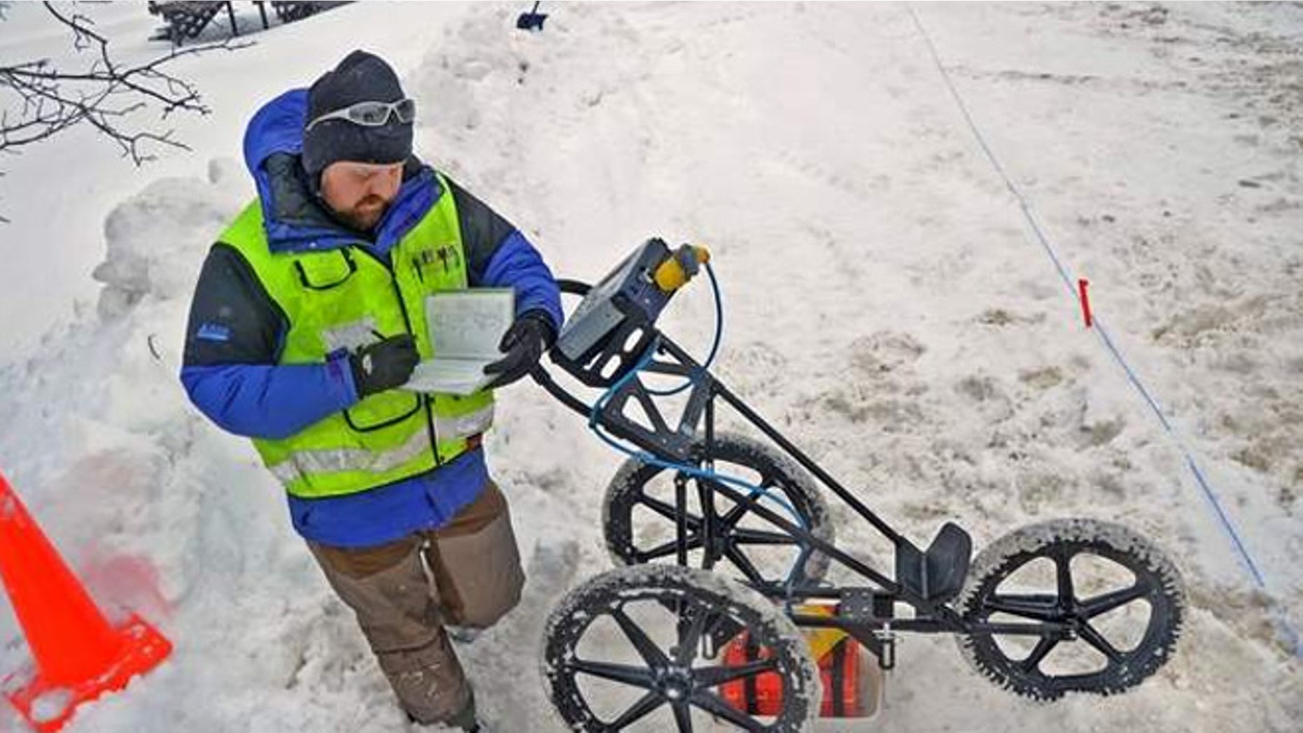 Seth A. Van Dam, a geophysical archaeologist takes notes while investigating potential Native American artifacts that could affect the creation of a new sewer district in Upstate New York