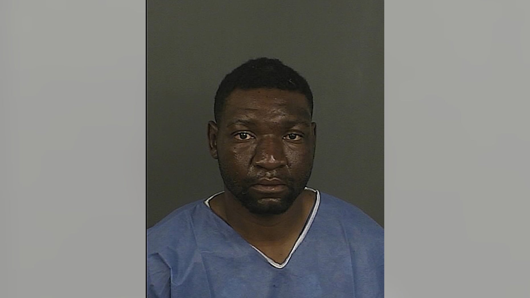 Dejuan Stamps, 28, is accused of murdering a 62-year-old man who tried to stop an attack on two teenagers, police said. (Denver Police Department)