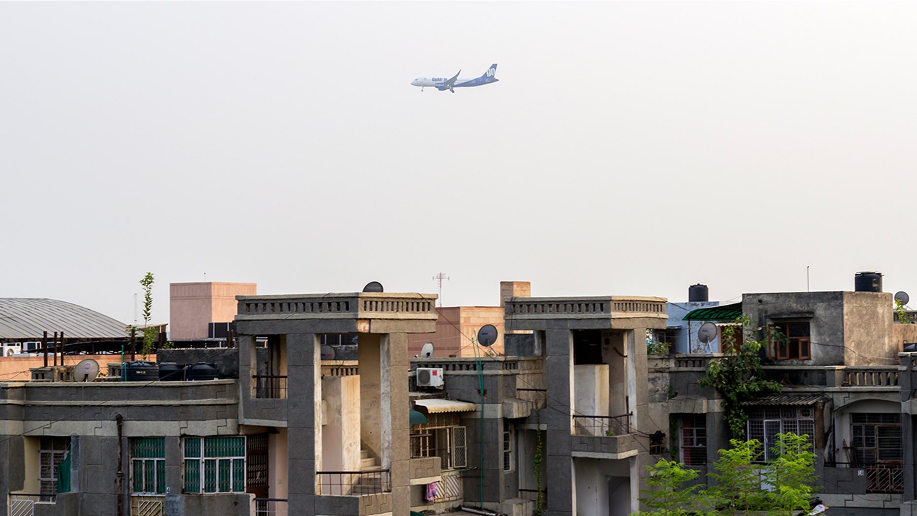 Residents near the Delhi Airport claim they get rained on by human poop from passing airplanes