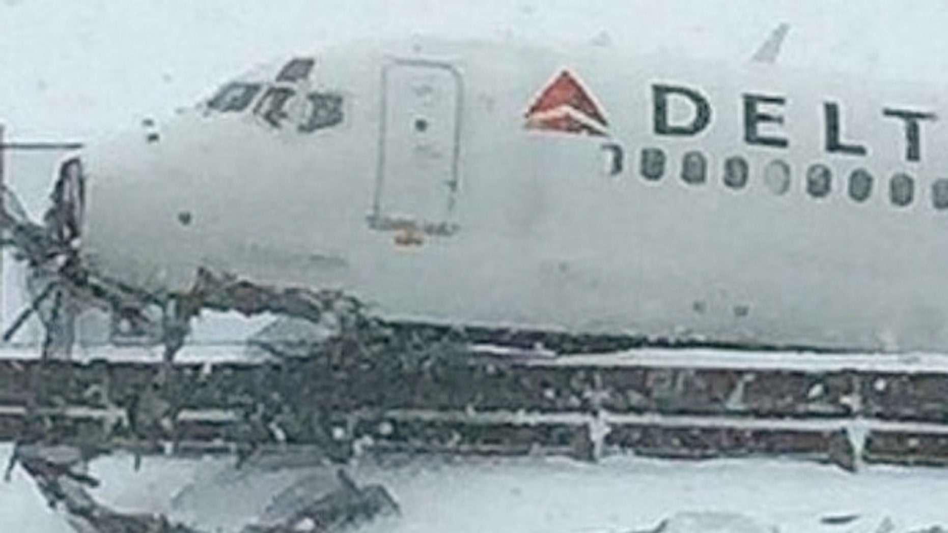 Social media floods with images of Delta flight that skidded off LGA
