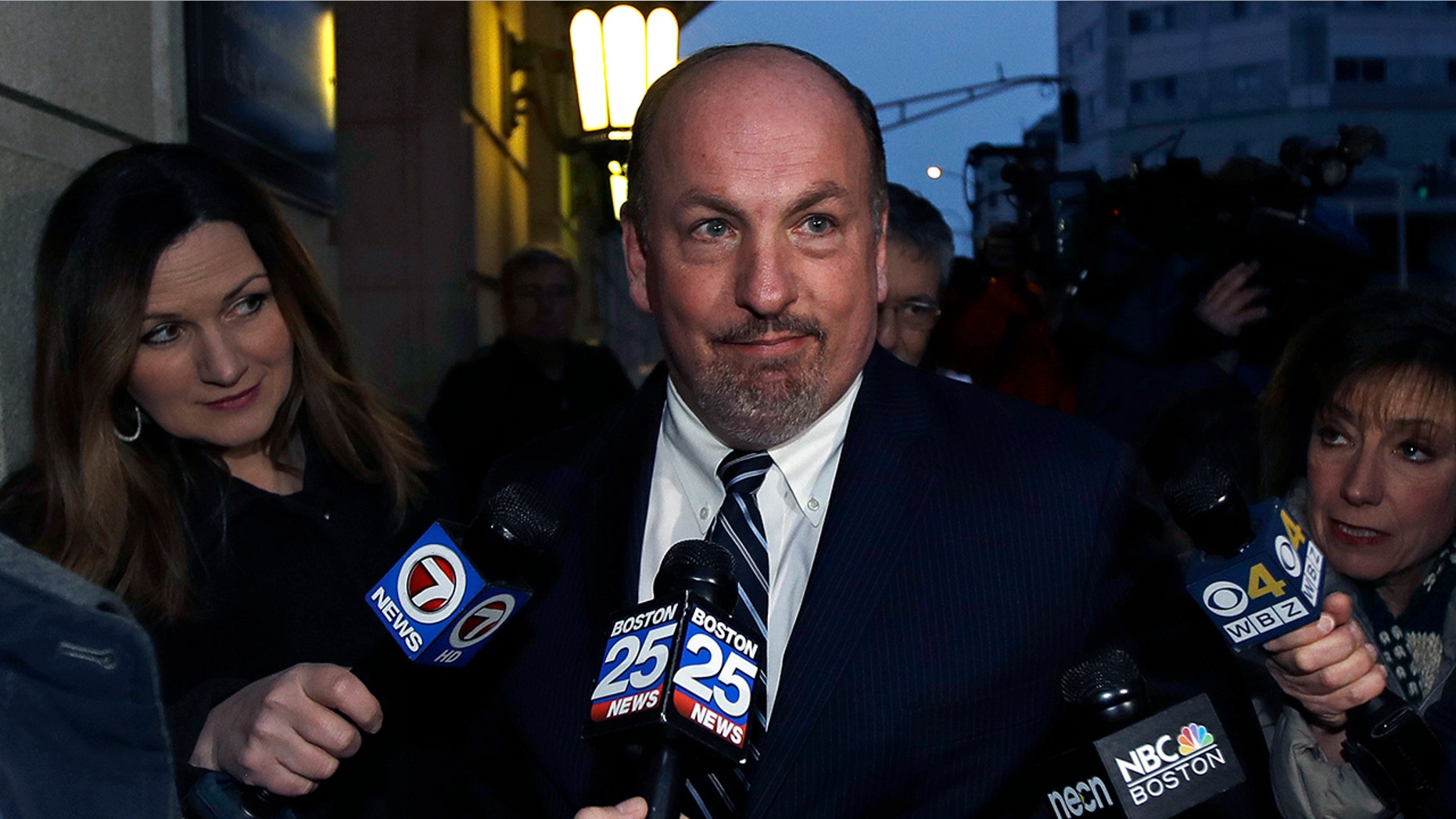 Former Massachusetts state Sen. Brian Joyce talks to reporters after leaving a federal courthouse in Worcester, Mass., Dec. 8, 2017.