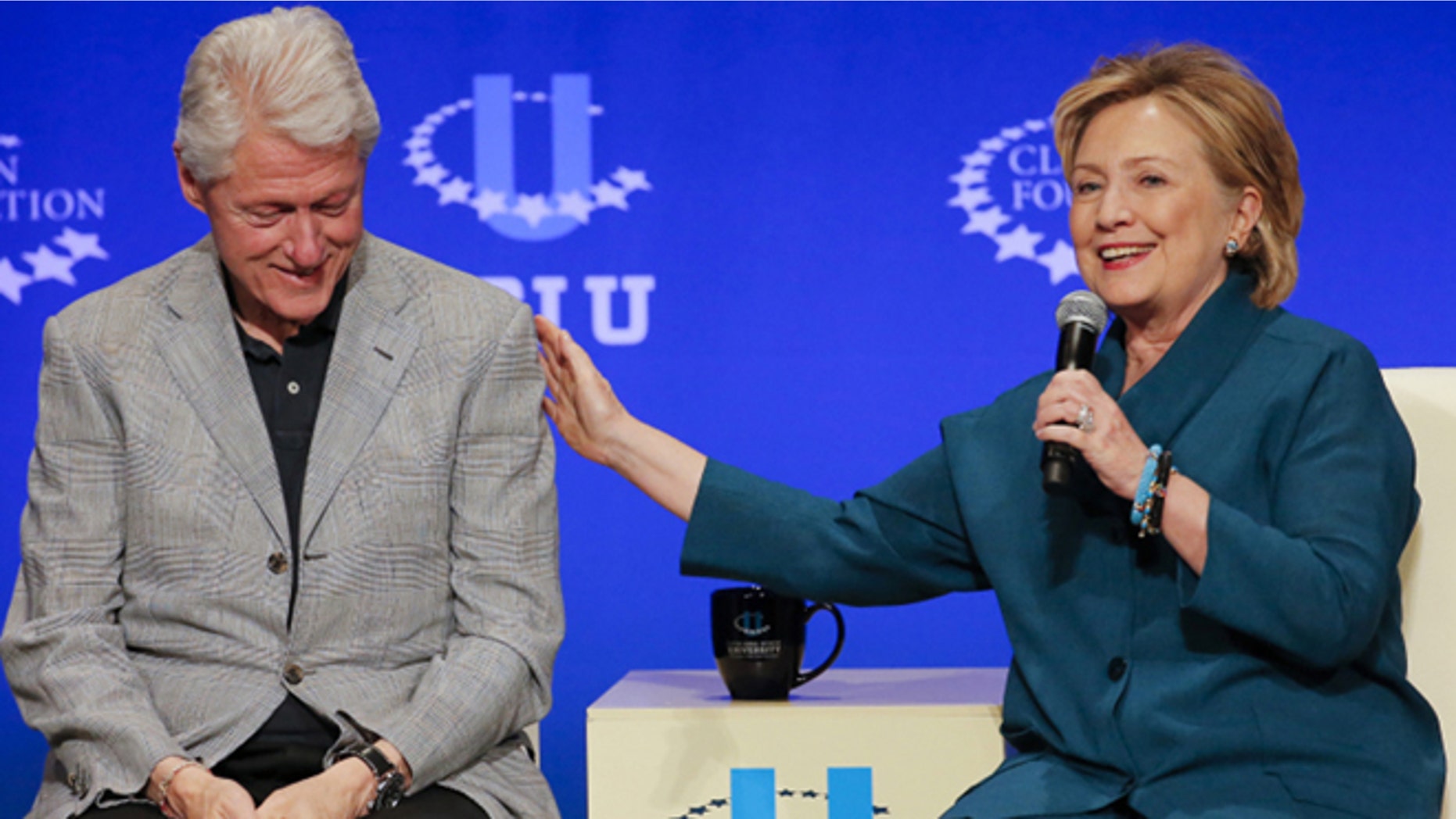 Former President Bill Clinton and Hillary Rodham Clinton are shown in this AP photo.