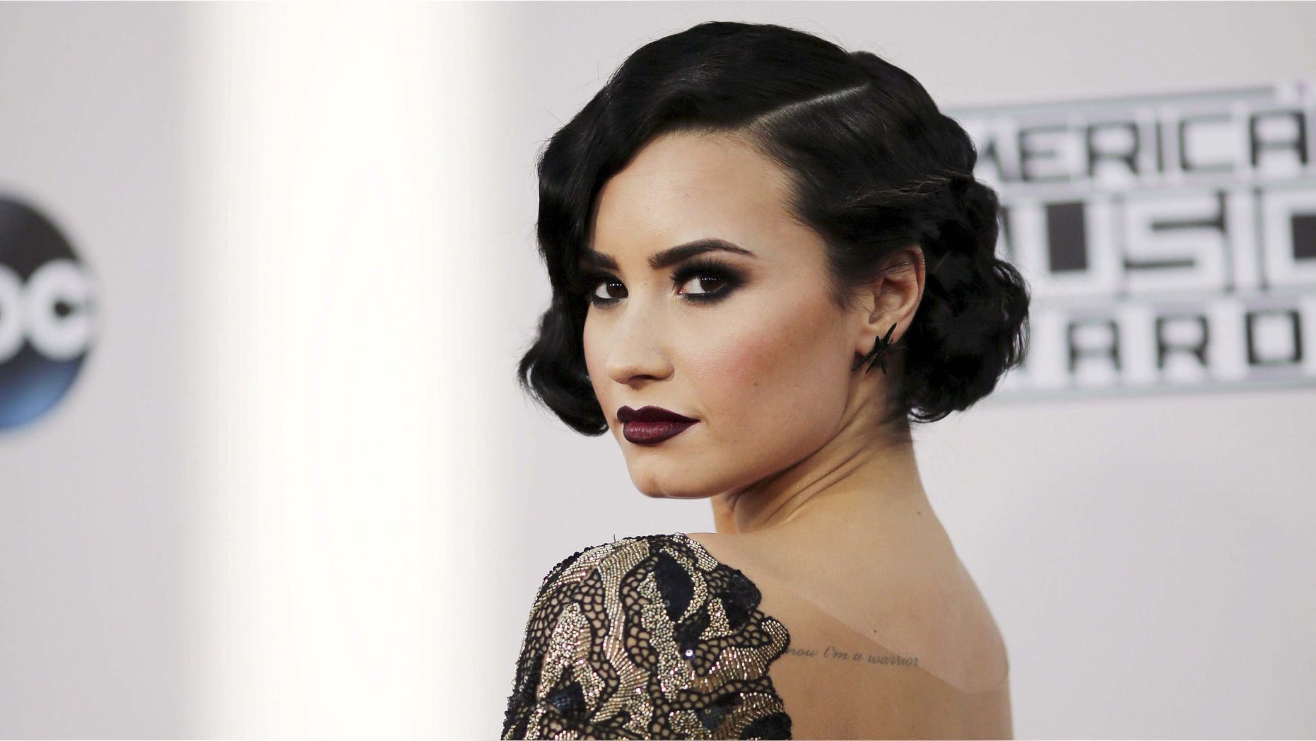 November 22, 2015. Singer Demi Lovato arrives at the 2015 American Music Awards in Los Angeles, California.