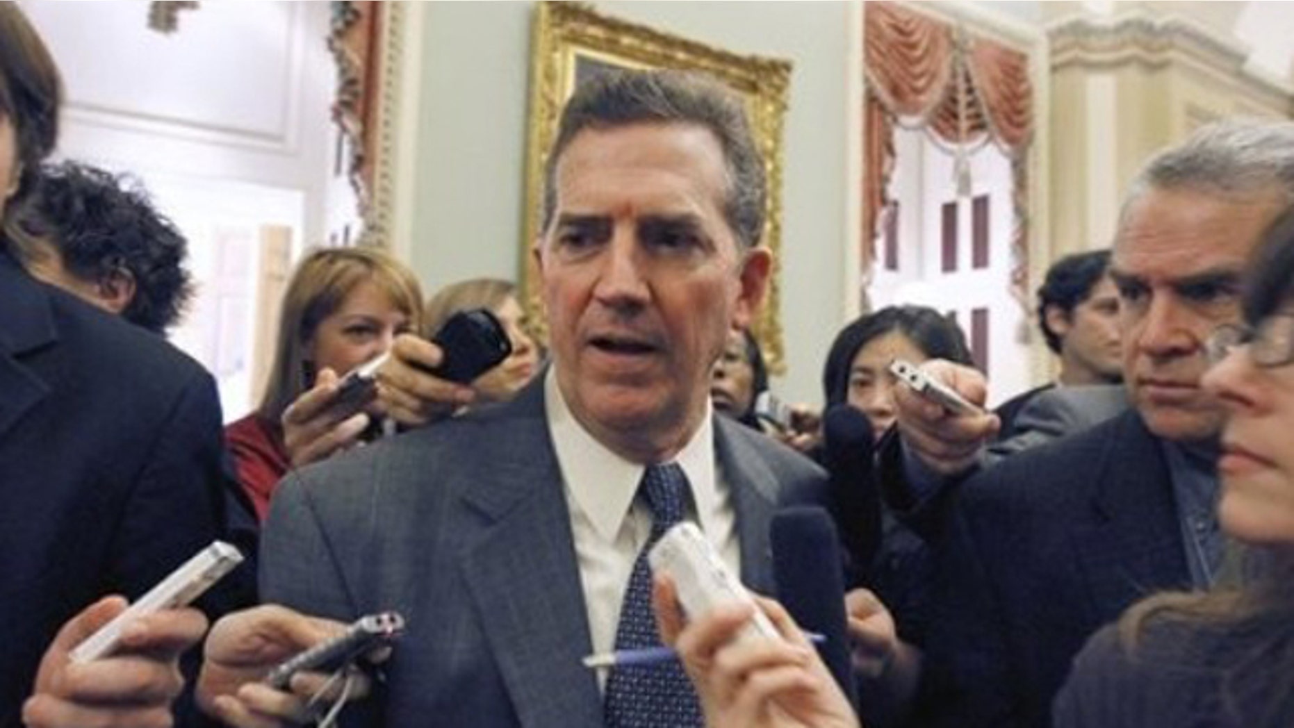 In this Nov. 16, 2010 photo, Sen. Jim DeMint talks with reporters on Capitol Hill in Washington.