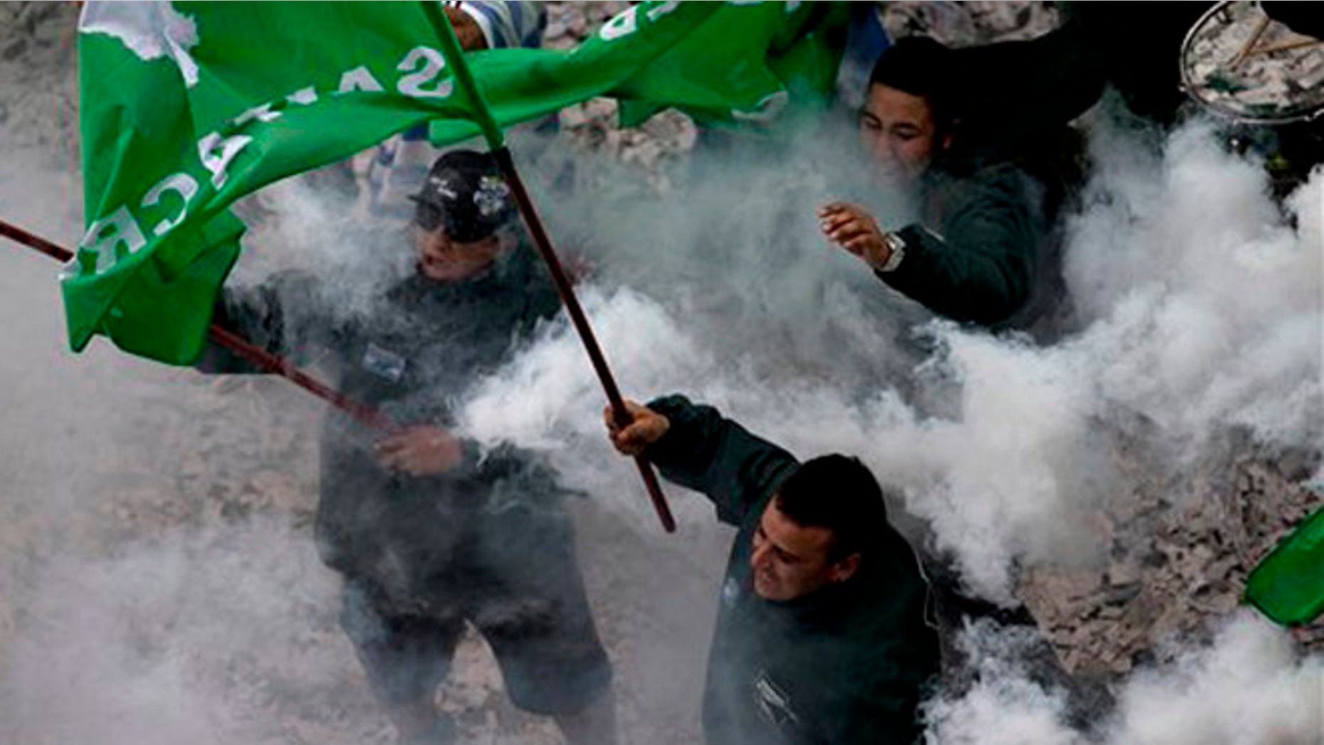Workers protest skyrocketing consumer prices and job cuts in Buenos Aires, Argentina, Friday, April 29, 2016. Thousands of state employees have been fired since Argentina's President Mauricio Macri came to power in December with promises to cut spending. The protest was staged ahead of Sundays May 1 Labor Day. (AP Photo/Natacha Pisarenko)