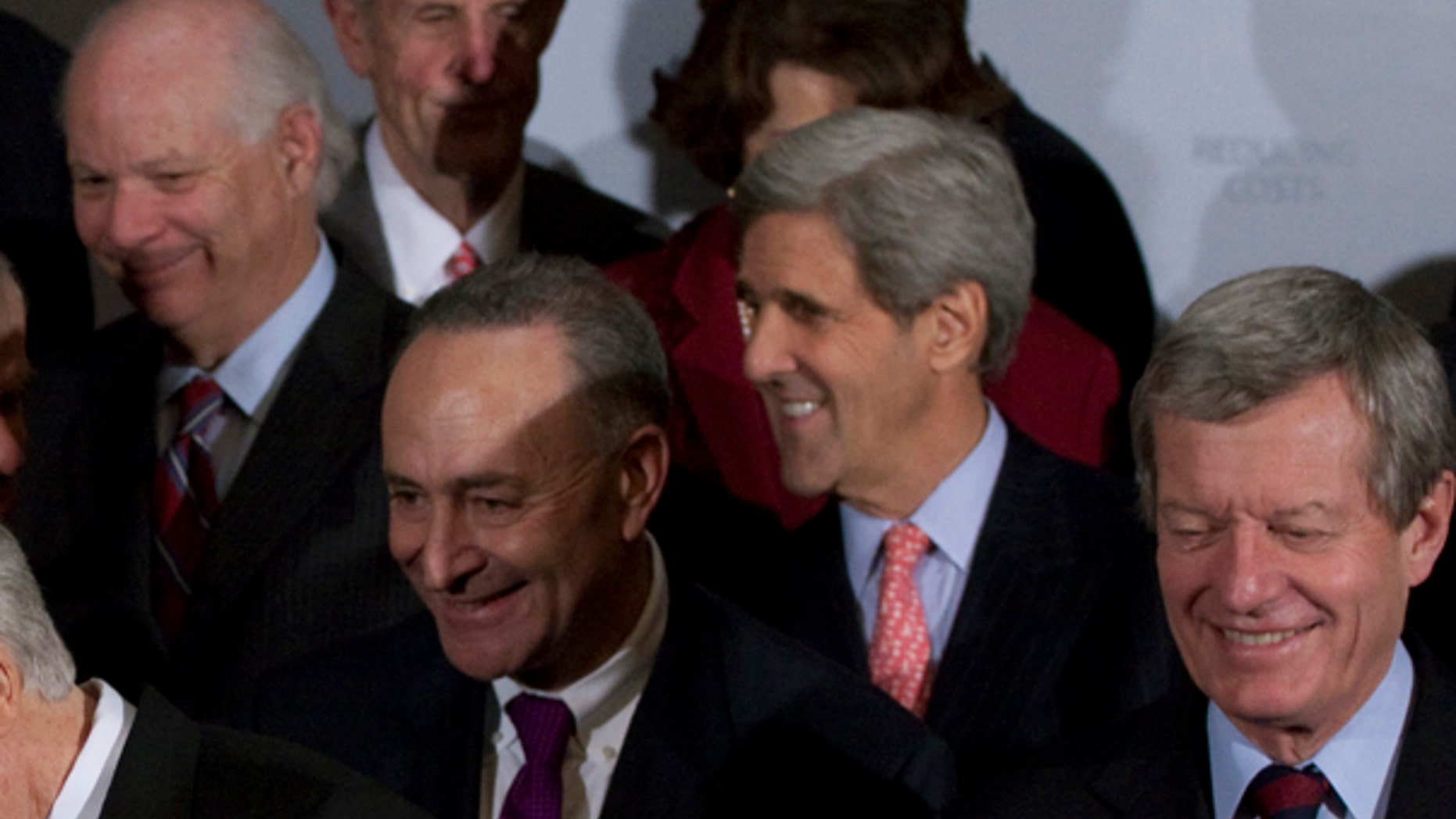 Wednesday: Sen. John Kerry shared a laugh with other Senate Democrats during a health care news conference. (AP Photo)