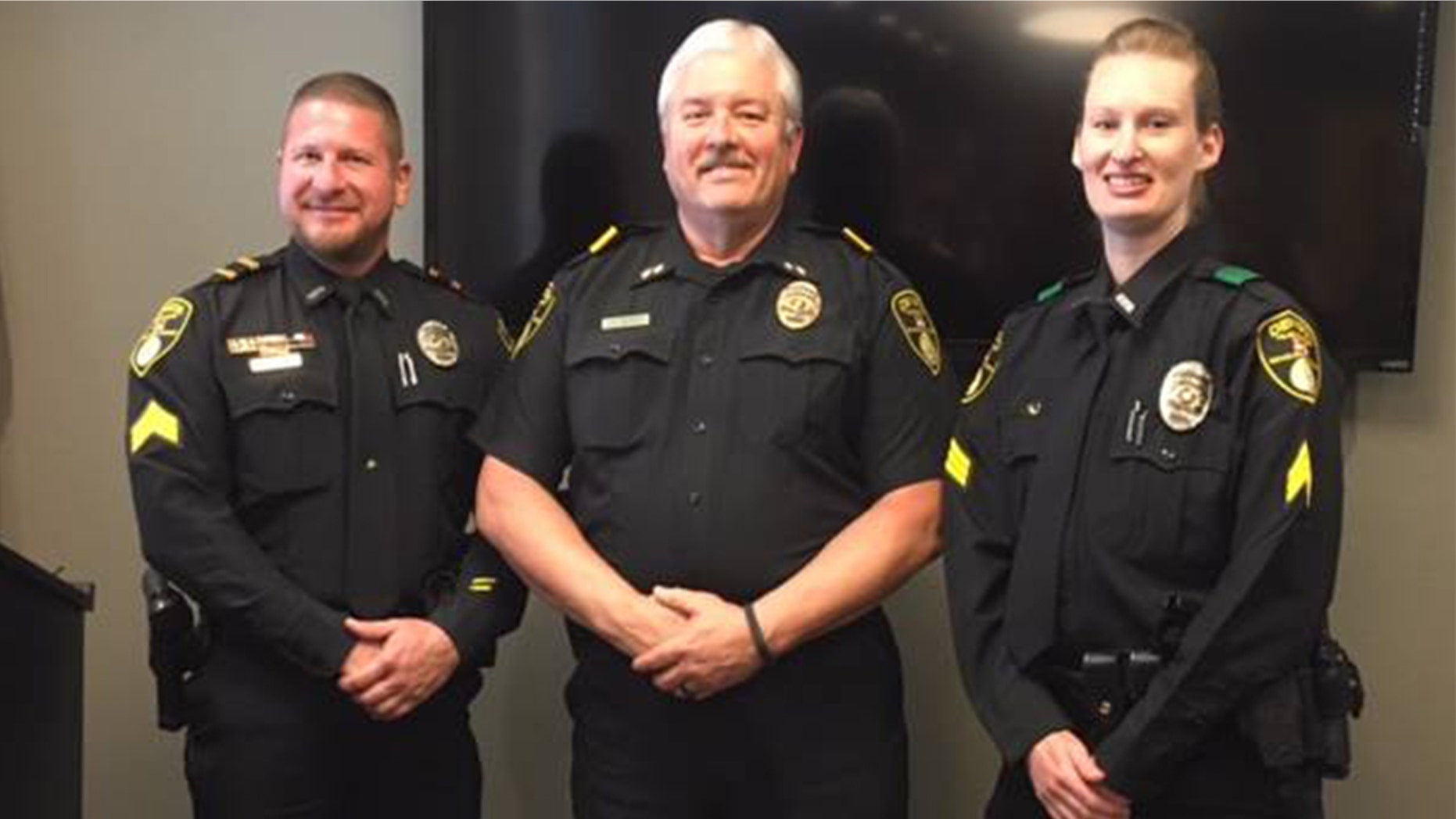 Denison Police Chief Jay Burch (c) with Sgt. Chris Kuhn (l) and Sgt. Holly Jenkins (r).