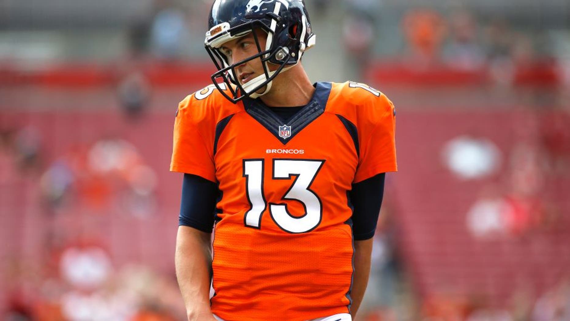 TAMPA, FL - OCTOBER 2: Quarterback Trevor Siemian #13 of the Denver Broncos warms up before the start of an NFL game against the Tampa Bay Buccaneers on October 2, 2016 at Raymond James Stadium in Tampa, Florida. (Photo by Brian Blanco/Getty Images)