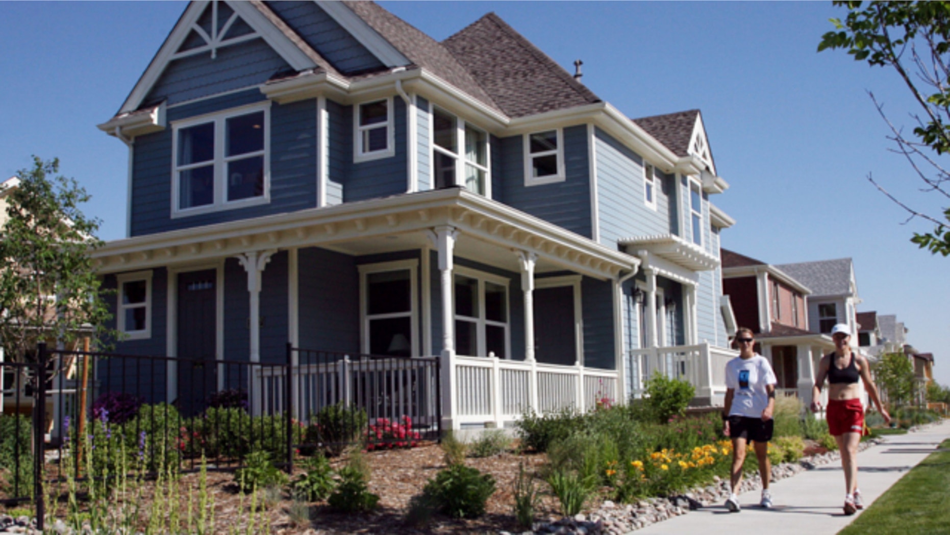 FILE: June 14, 2006: A model home by KB Homes in the Stapleton Coach House development is shown on the site of the defunct Stapleton International Airport in Denver, Colo.