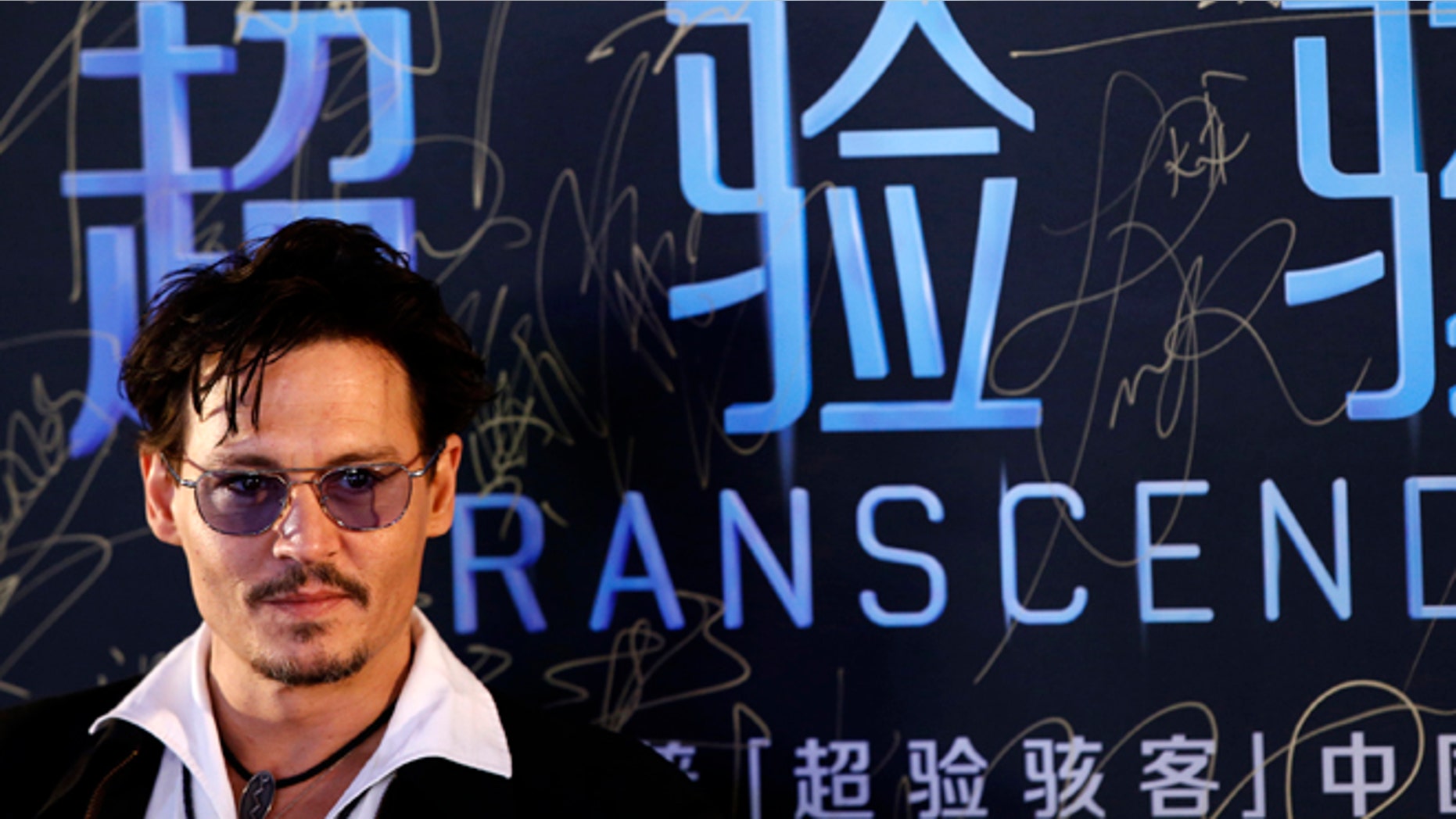 Actor Johnny Depp attends a red carpet event to promote his new movie "Transcendence", on his first visit to China in Beijing March 31, 2014.REUTERS/Kim Kyung-Hoon (CHINA - Tags: ENTERTAINMENT) - RTR3JBV1