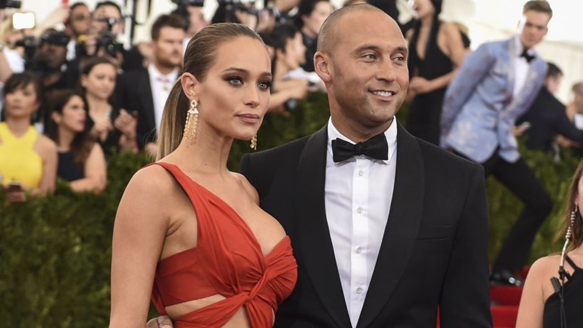 Derek Jeter and Hannah Davis arrive at the Costume Institute Gala Benefit at The Metropolitan Museum of Art May 5, 2015 in New York. AFP PHOTO / TIMOTHY A. CLARY (Photo credit should read TIMOTHY A. CLARY/AFP/Getty Images)