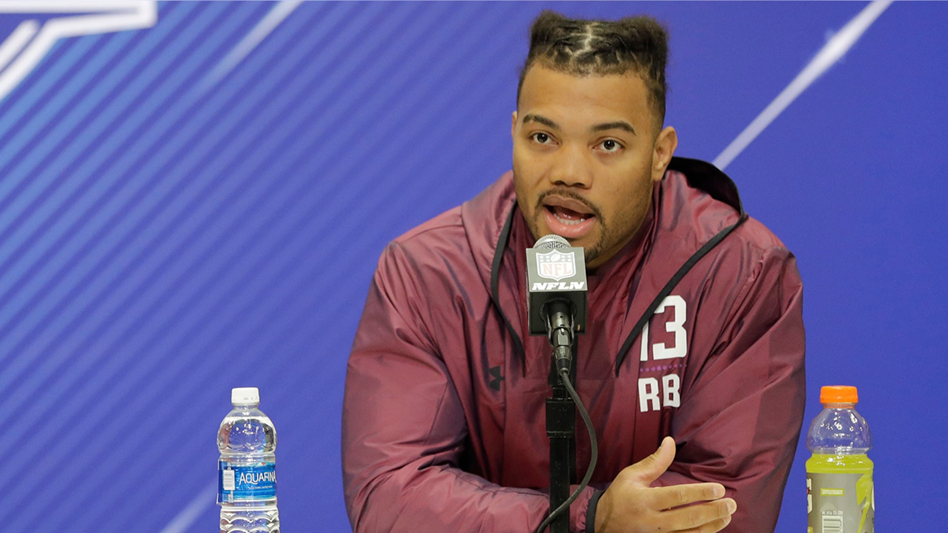 Louisiana State running back Derrius Guice speaks during a press conference at the NFL football scouting combine, Thursday, March 1, 2018, in Indianapolis.