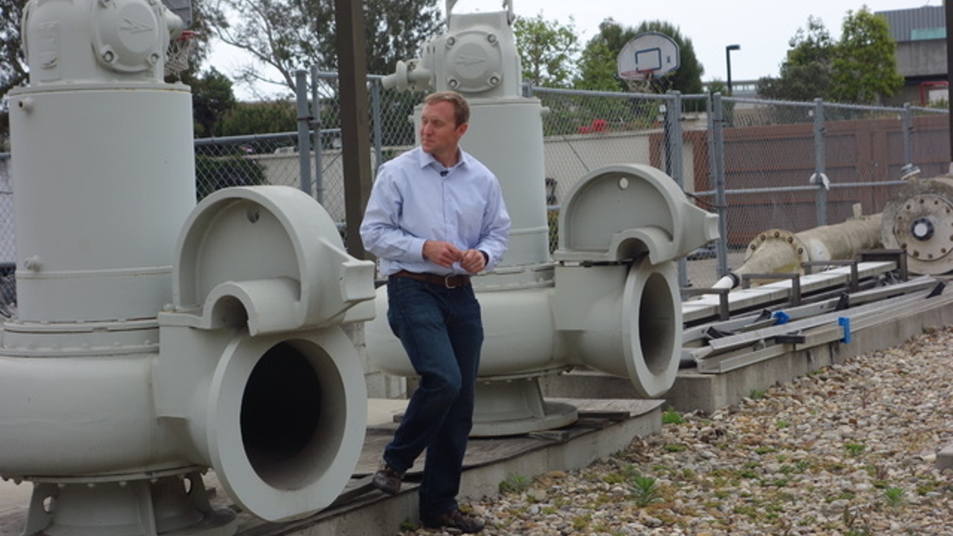 Joshua Haggmark, interim resources manager for Santa Barbara, Calif., looks at equipment that was brought up from the ocean floor after the city shut down its desalination plant more than two decades ago. (AP)