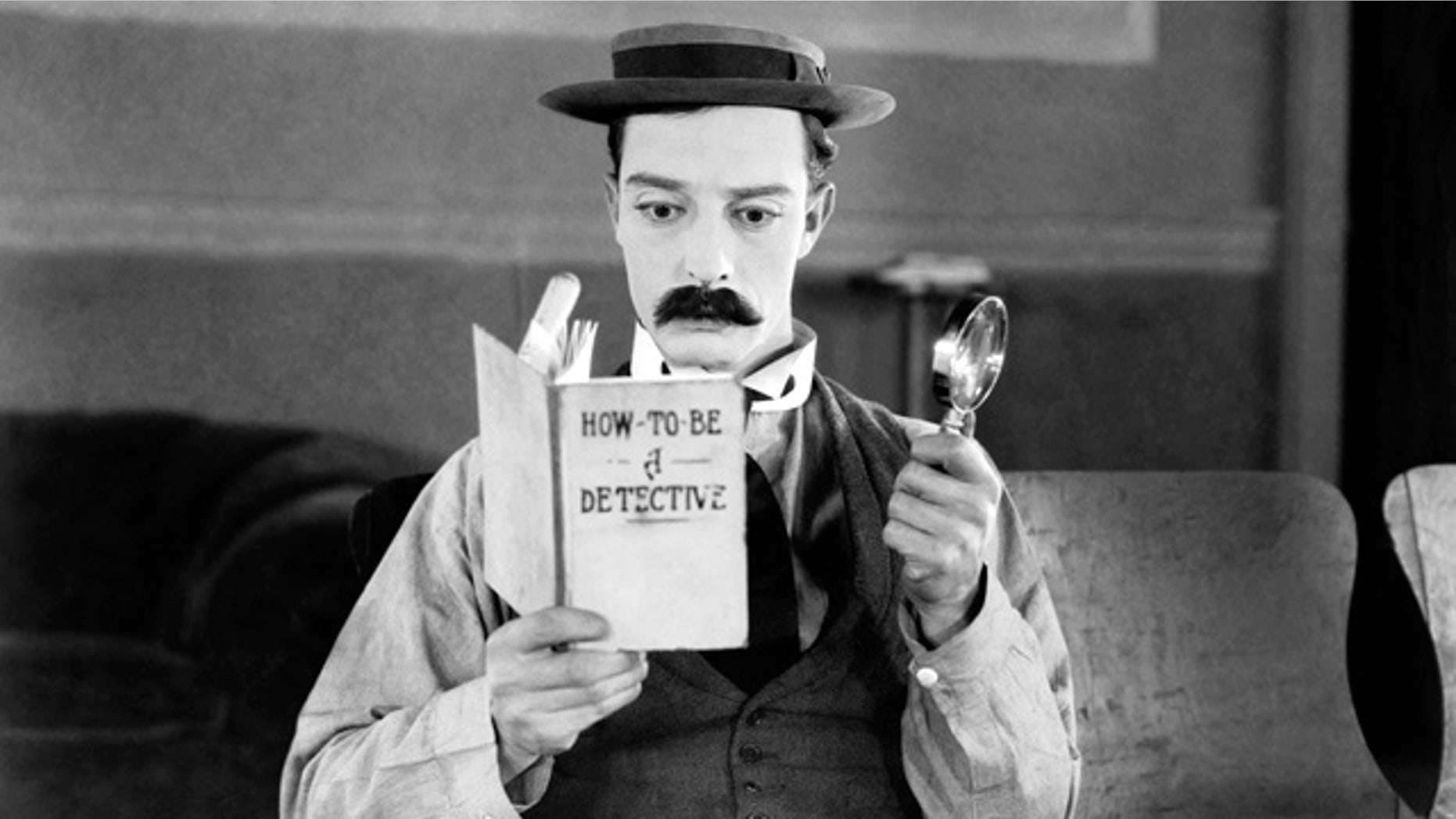 American comedian Buster Keaton hopes to become a great detective in the film 'Sherlock Junior.'