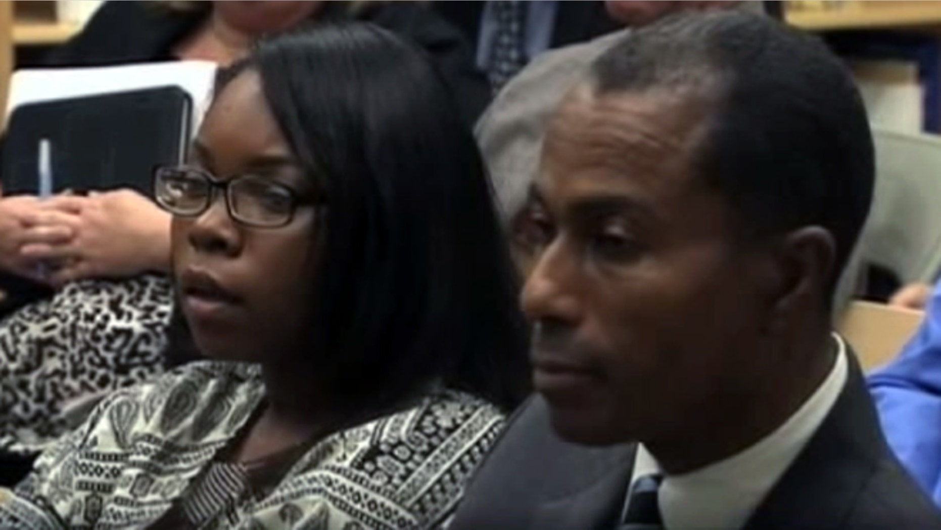Atiya Haynes, seen here with her attorney, said she forgot that she was carrying a pocketknife that her grandfather gave her for protection.