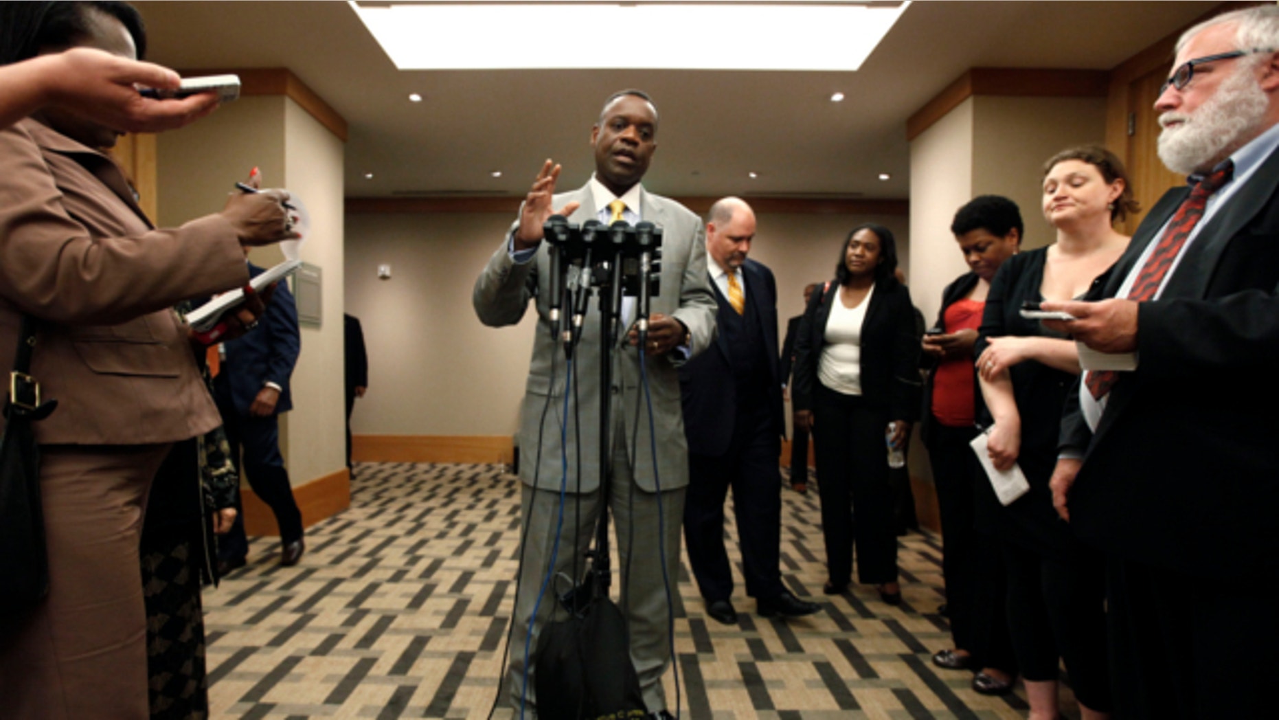 June 14, 2013: Detroit emergency manager Kevyn Orr speaks with reporters after a meeting with creditors in Romulus, Mich.