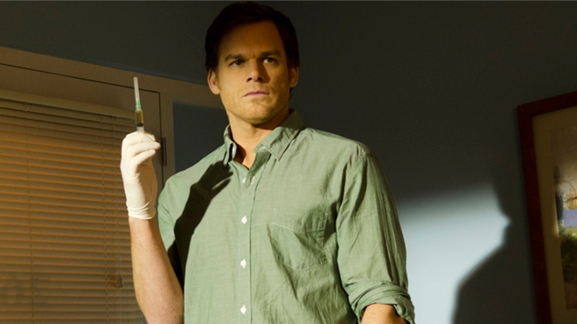 This undated publicity image released by Showtime shows Michael C. Hall as Dexter Morgan in a scene from the final season of "Dexter," airing on Showtime.