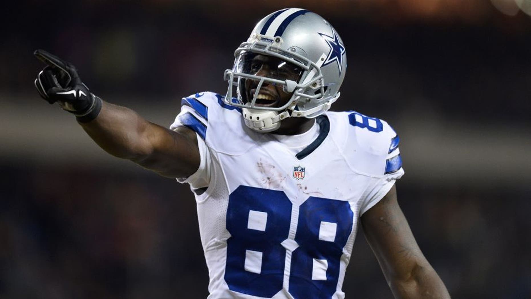 CHICAGO, IL - DECEMBER 4: Dez Bryant #88 of the Dallas Cowboys points to the fans during the third quarter against the Chicago Bears at Soldier Field on December 4, 2014 in Chicago, Illinois. The Cowboys defeated the Bears 41-28. (Photo by Brian D. Kersey/Getty Images)