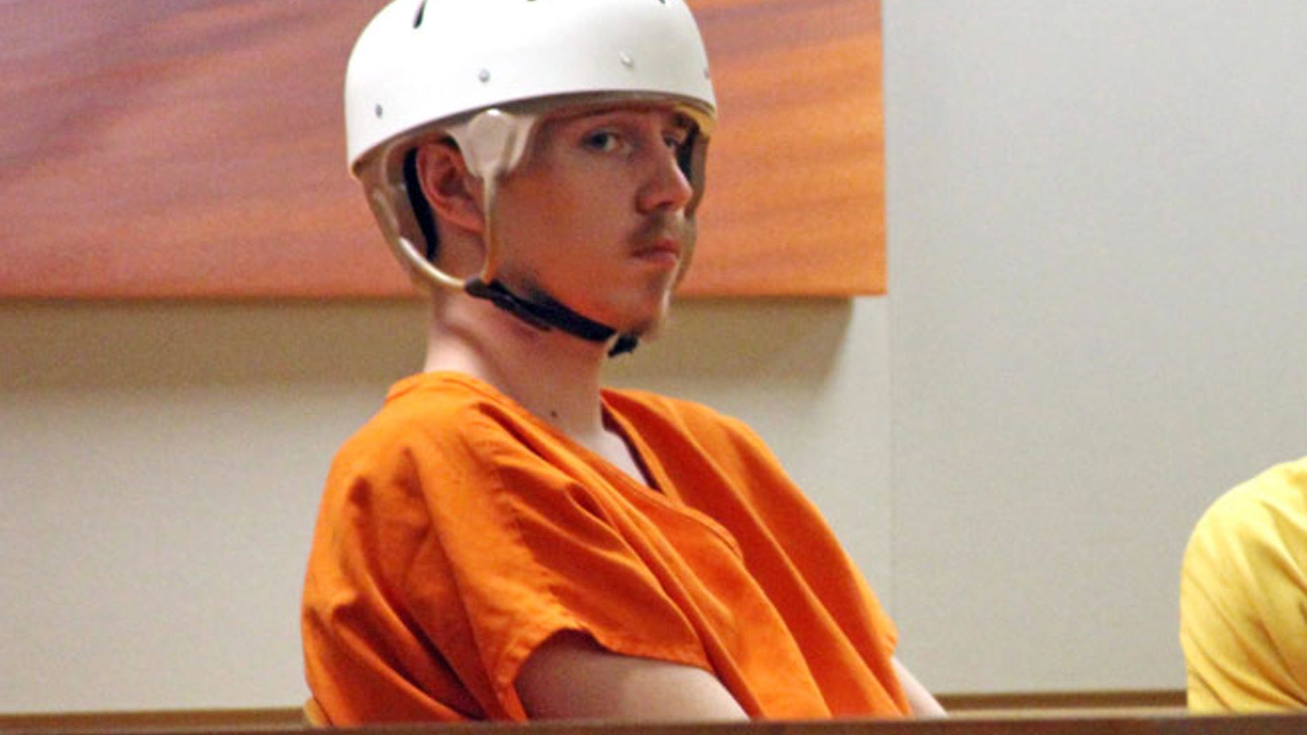 Victor Sibson, left, appears for his arraignment in Anchorage Superior Court on Tuesday