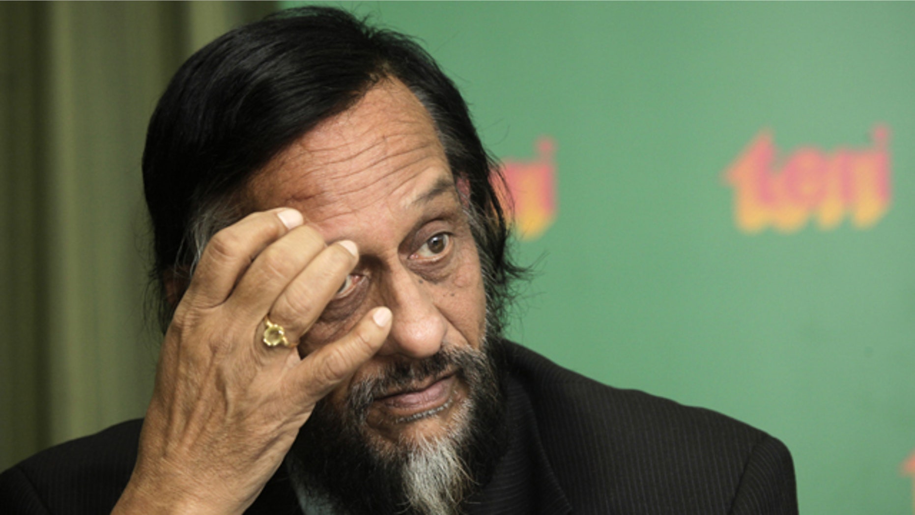 U.N. Intergovernmental Panel on Climate Change (IPCC) head Rajendra Pachauri looks on at a press conference in New Delhi, India.