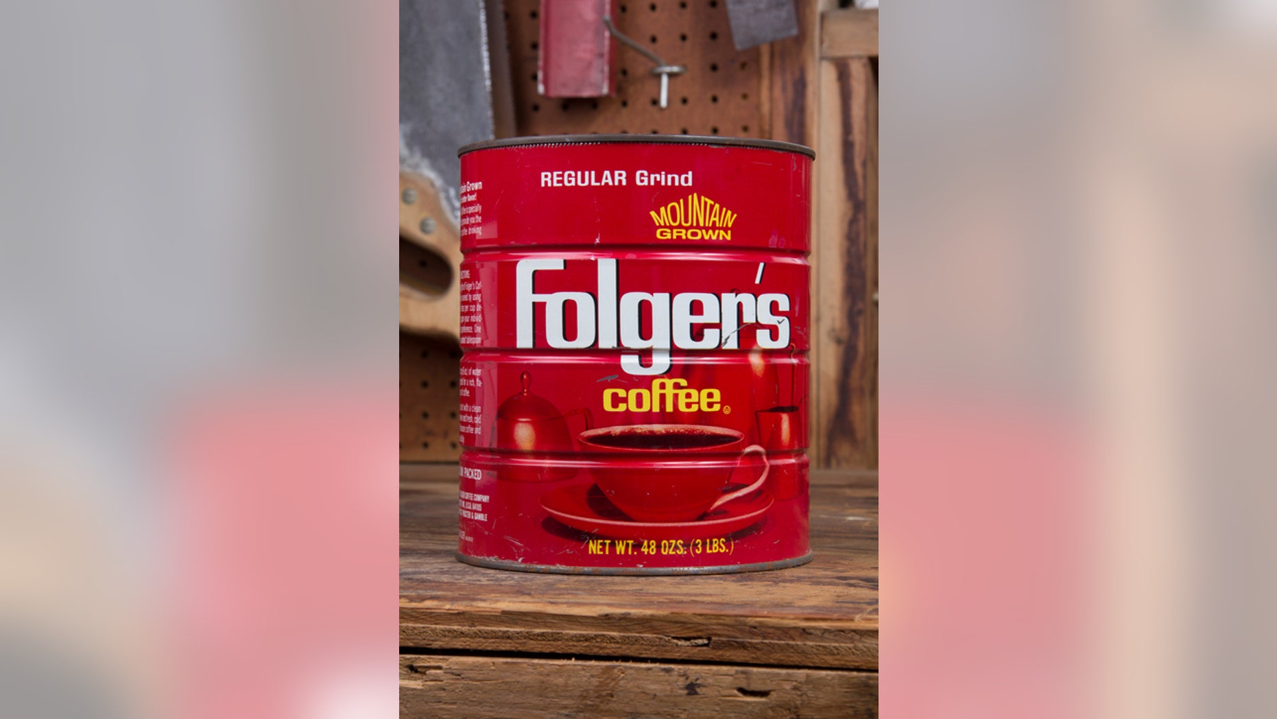 Joliet, IL- July 5, 2014: The coffee can remains a stand presence in the garage work space s a catch all for nails, bolts and miscellaneous items.