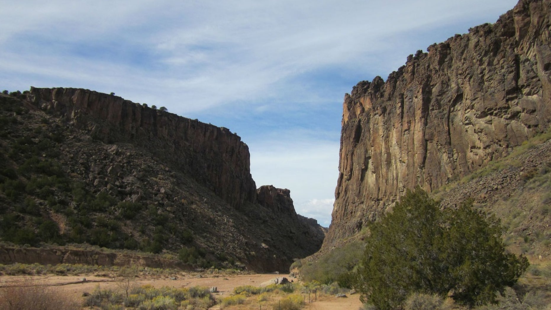 In this Nov. 3, 2012 photo, Santa Fe residents Gail Anderson, left, and Gail Flanagan return from a hike in Diablo Canyon in Santa Fe County in New Mexico. Santa Fe Countyâs only public access to the Rio Grande would undergo environmental restoration and get improved facilities if a proposed project gets the green light from federal officials this spring. (AP Photo/The New Mexican, Julie Ann Grimm)