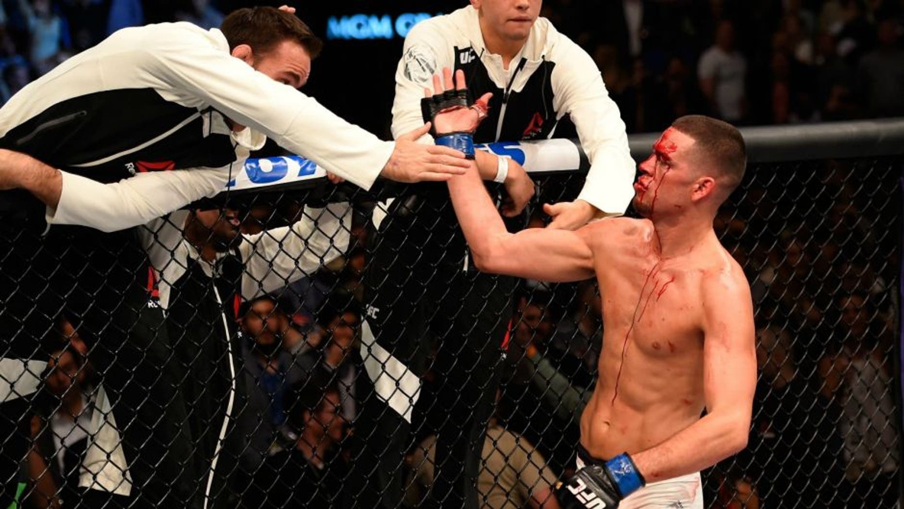 in their welterweight bout during the UFC 196 event inside MGM Grand Garden Arena on March 5, 2016 in Las Vegas, Nevada.