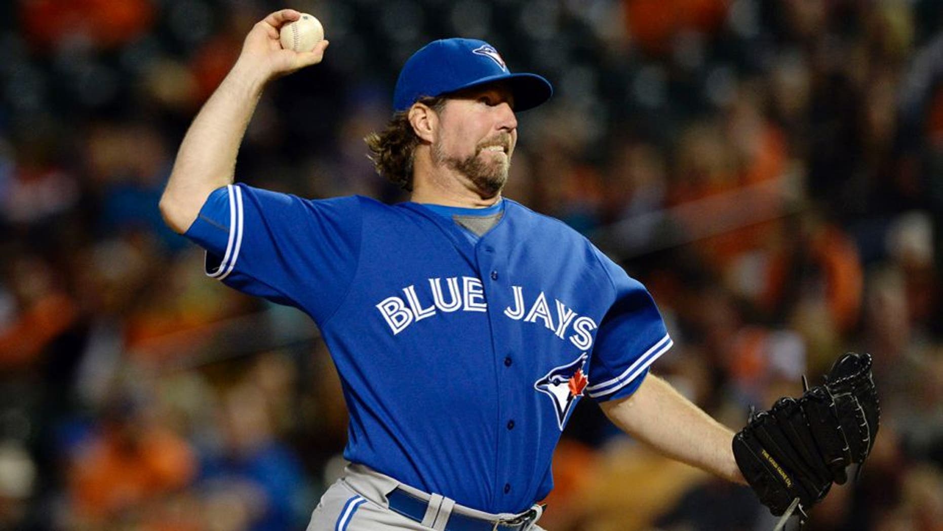 Sep 30, 2015; Baltimore, MD, USA; Toronto Blue Jays starting pitcher R.A. Dickey (43) pitches during the third inning against the Baltimore Orioles at Oriole Park at Camden Yards. Mandatory Credit: Tommy Gilligan-USA TODAY Sports