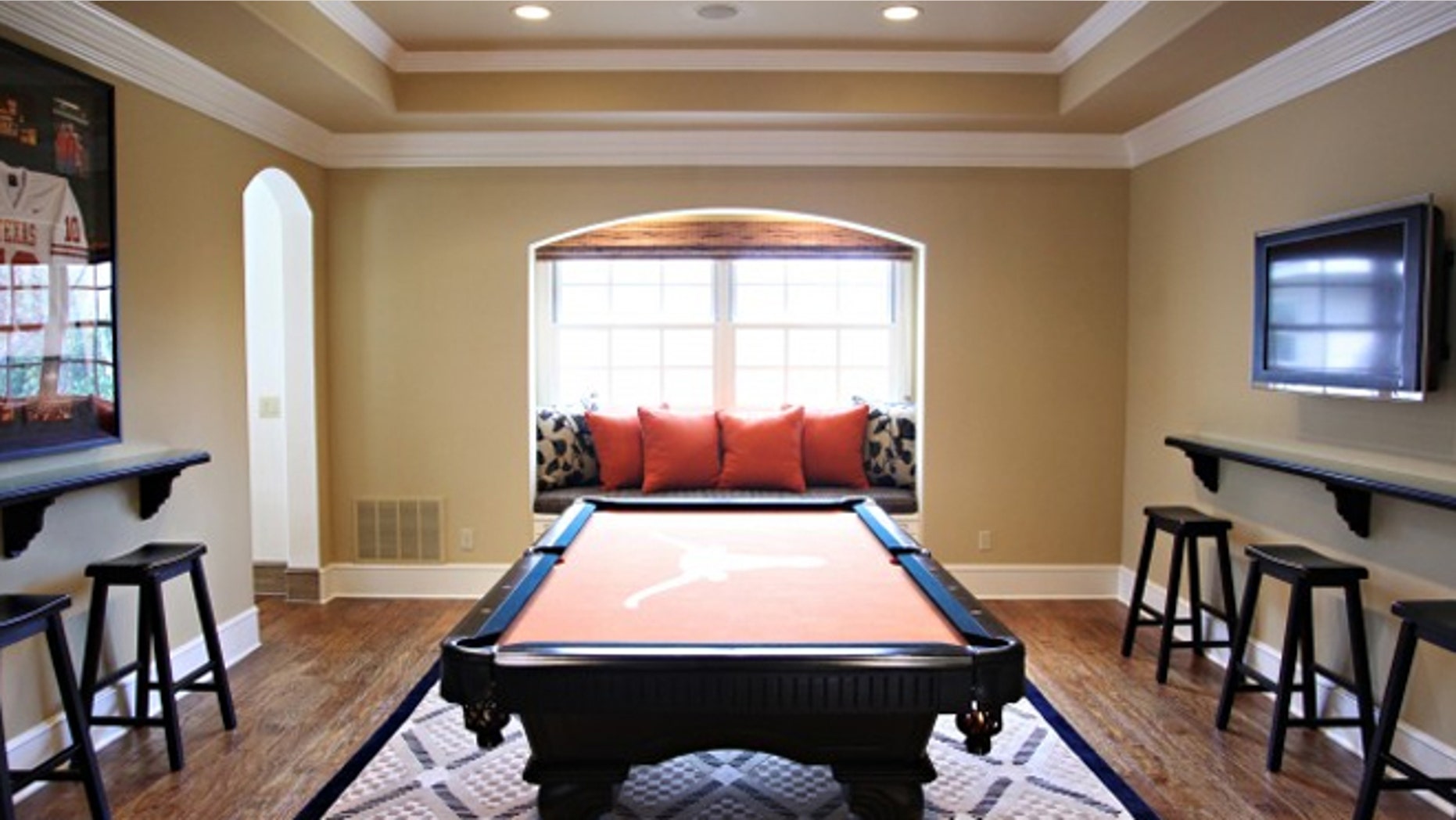 This dining room was re-envisioned as an entertainment room, with a dining table swapped out for a billiards table.