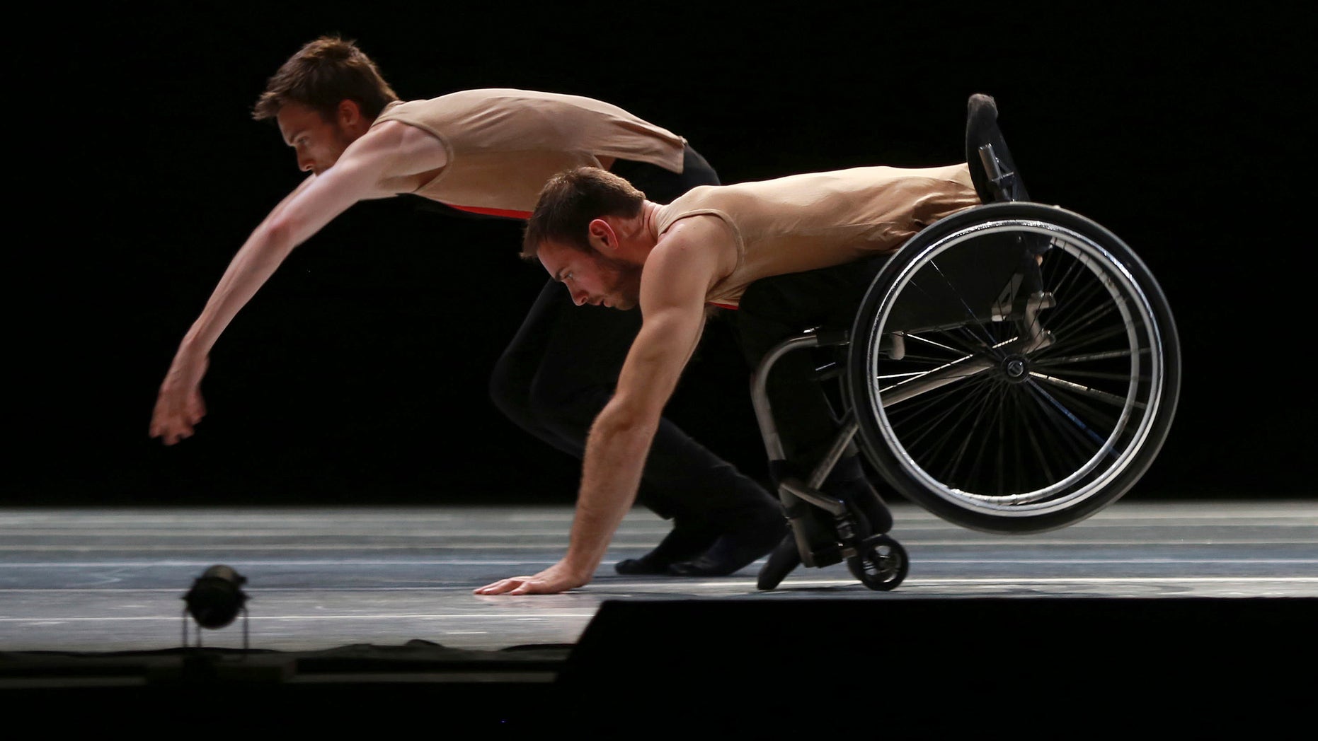 Dancers from the United Kingdom's Candoco Dance Company perform a piece called "Let's Talk About Dis" at the Guanajuato State Auditorium during the 43rd edition of the Cervantino International Festival in Guanajuato, Mexico, Sunday, Oct. 11, 2015. The Candoco Dance Company mixes disabled and non-disabled dancers in many of its choreographies. (AP Photo/Mario Armas)