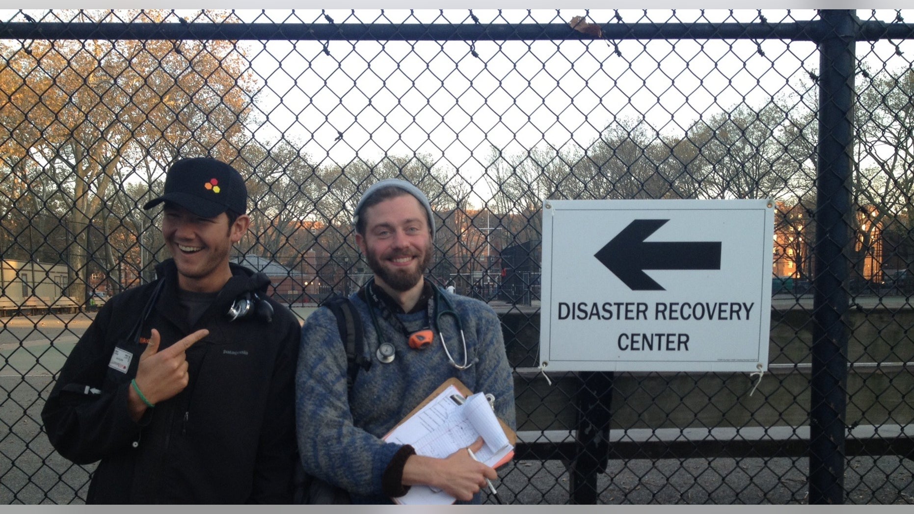 Matthew Kraushar (center) in Red Hook while looking for sick patients in the Brooklyn neighborhood