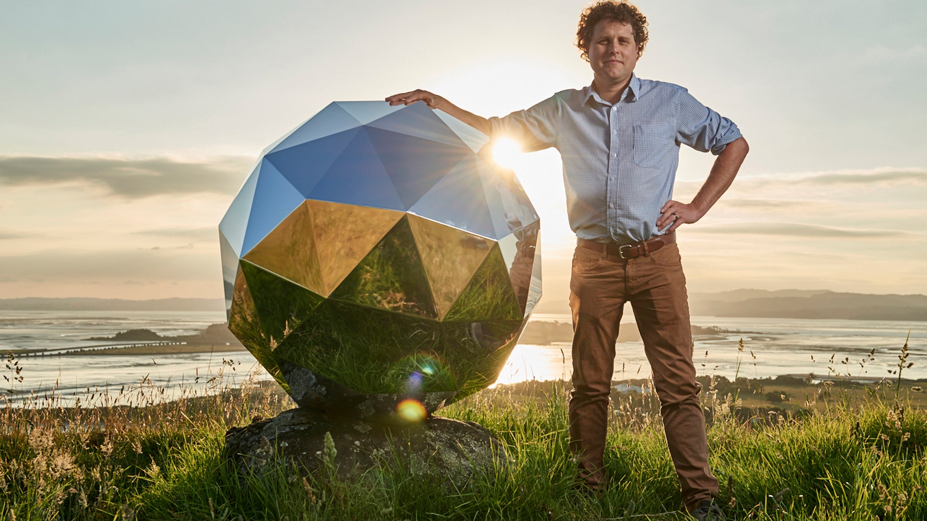File photo - In this Nov. 2017 photo provided by Rocket Lab, Rocket Lab founder and CEO Peter Beck is pictured with his "Humanity Star" in Auckland, New Zealand. (Rocket Lab via AP)