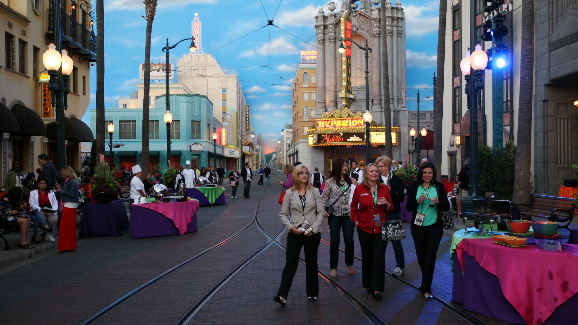 June 14, 2012: People walk on Buena Vista Street, which is based on 1920s Hollywood landmarks, on the eve of the public grand reopening of Disney California Adventure Park in Anaheim, California.