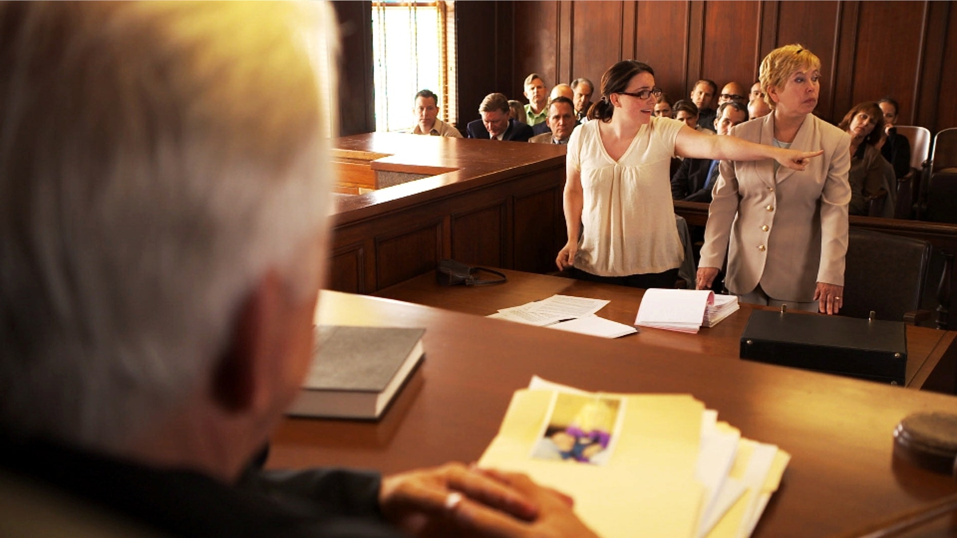A scene from "Divorce Corp" is shown.