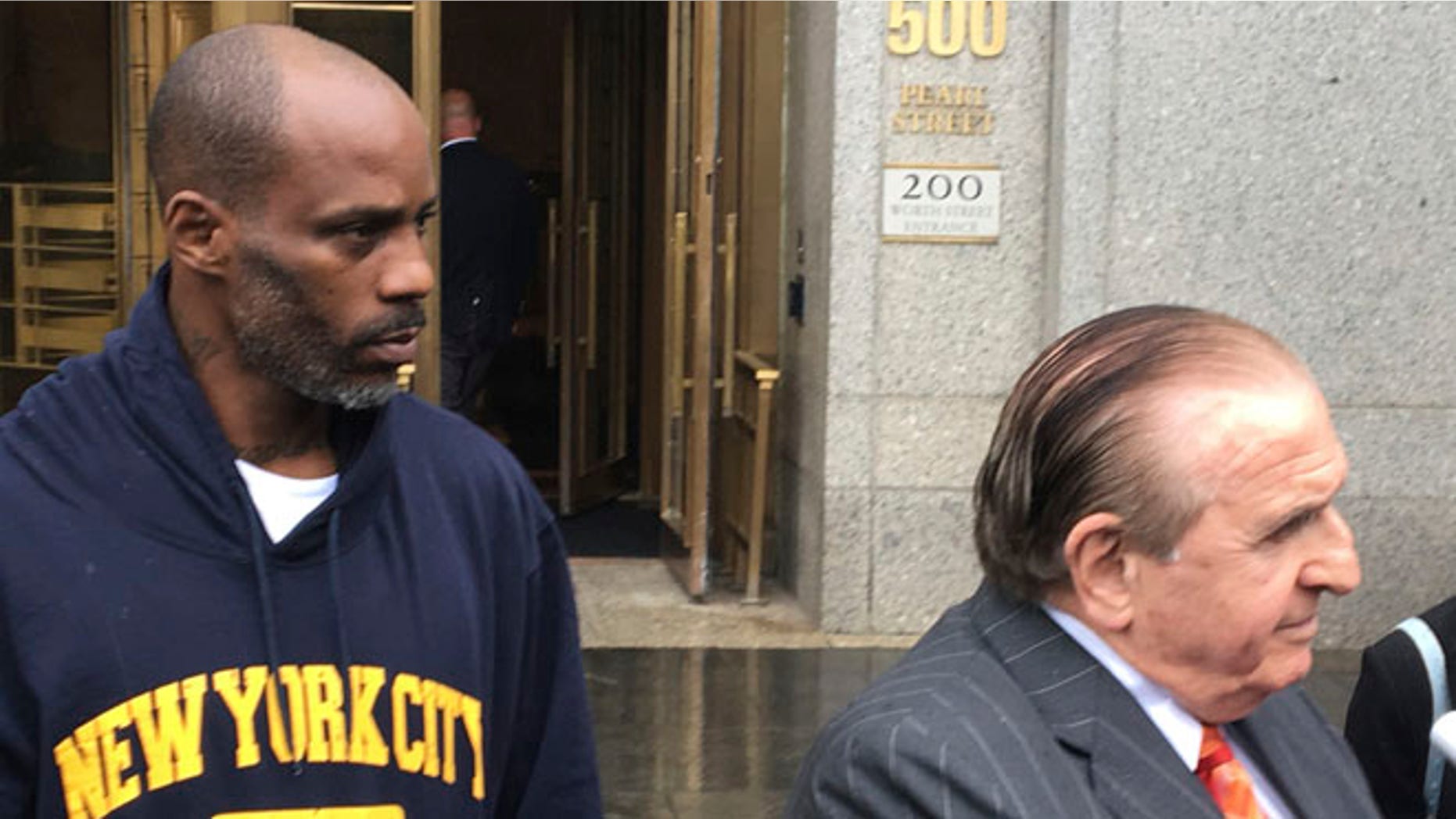 Rapper DMX leaving federal court on Friday, July 14, after pleading not guilty to tax evasion.