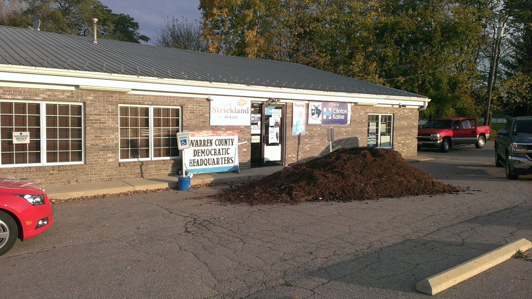 A giant pile of manure was dumped outside the Warren County Democratic headquarters.