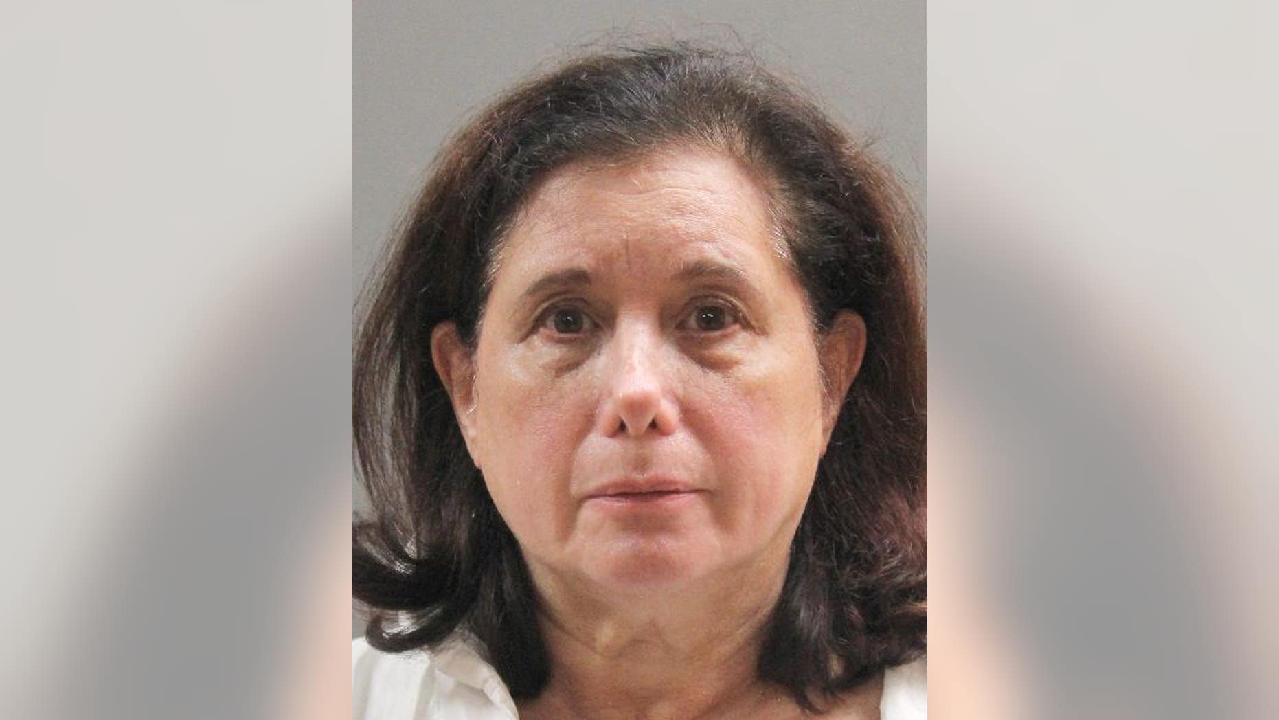 Faye Doomchin, 66, is accused of stabbing a British tourist to death in her Long Island home.