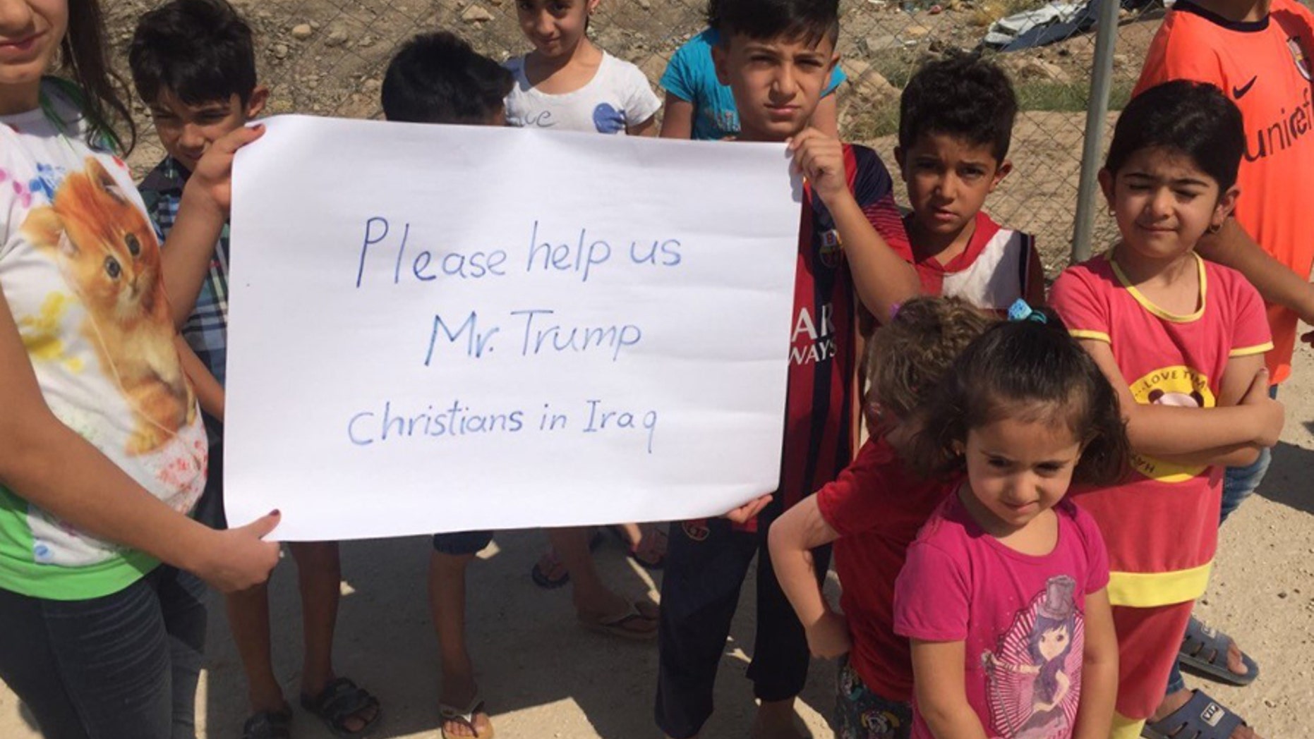 Images provided to Fox News show Christian Iraqi children pleading for help from the US, which experts say underscores the plight faced by the country's religious minorities.