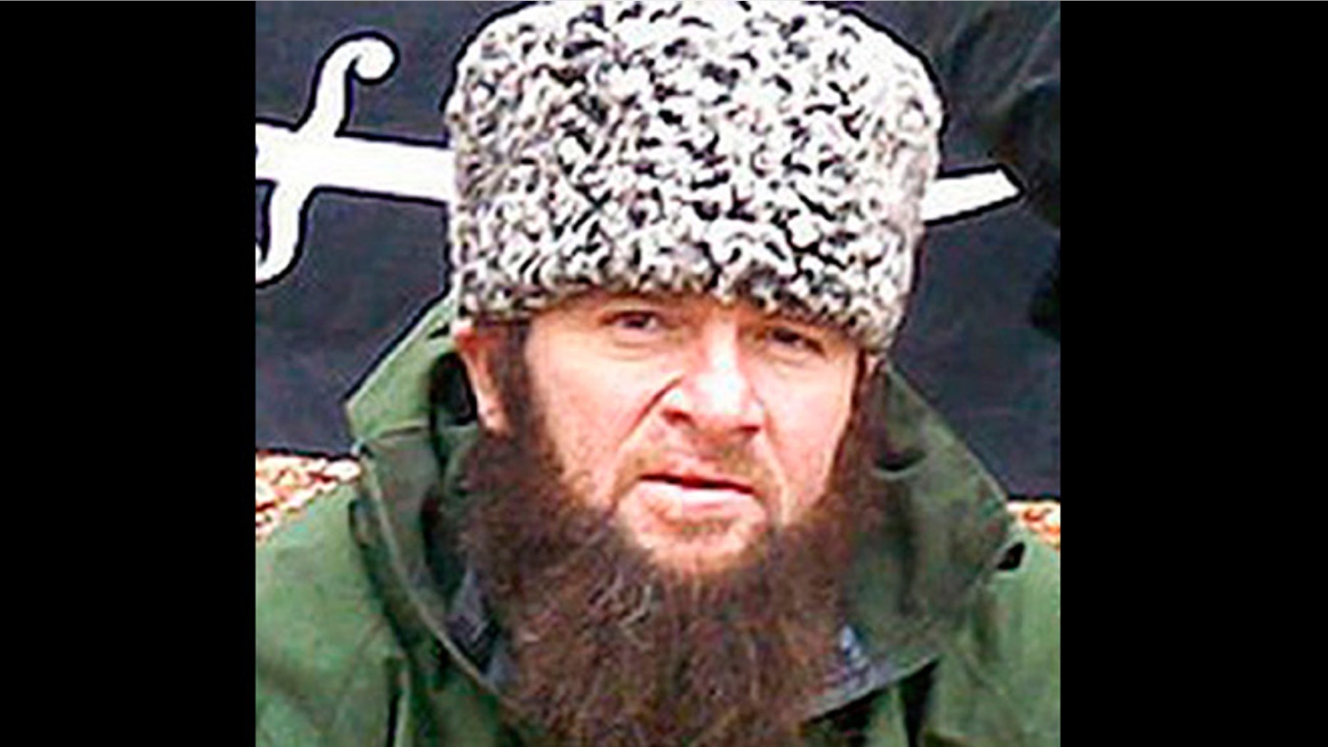 In this screen shot taken in Moscow, Wednesday, Dec. 2, 2009 of a computer screen showing an undated photo of a man identified as Chechen separatist leader Doku Umarov posted on the Kavkazcenter.com site.