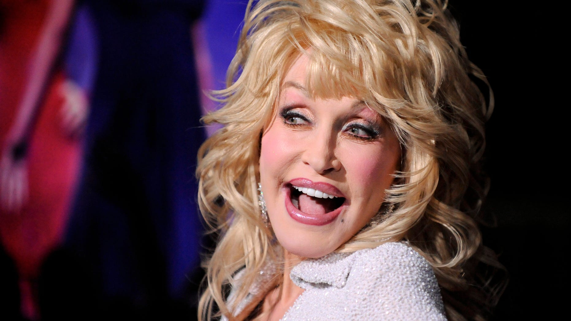 January 9, 2012. Dolly Parton arrives at the Hollywood premiere of "Joyful Noise" in Los Angeles, California.