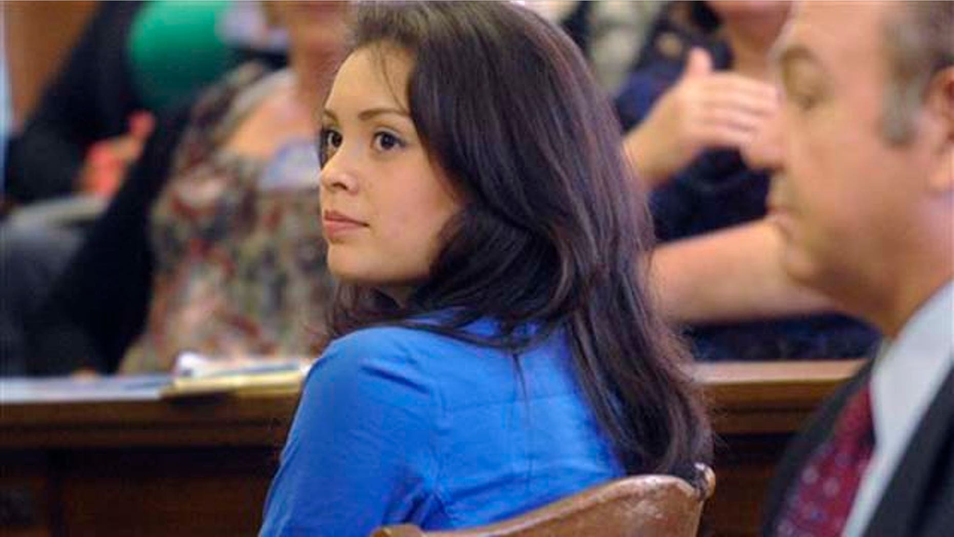 In this March 16, 2011 photo, former Miss San Antonio Dominique Ramirez sits in court during opening arguments in her lawsuit against the Miss San Antonio pageant. Ramirez, who was allegedly told to "get off the tacos" before being stripped of her crown in January, has sued to regain her crown and be allowed to compete in the Miss Texas contest, a run-up to the Miss America pageant. (AP Photo/The San Antonio Express-News, Billy Calzada) RUMBO DE SAN ANTONIO OUT; NO SALES