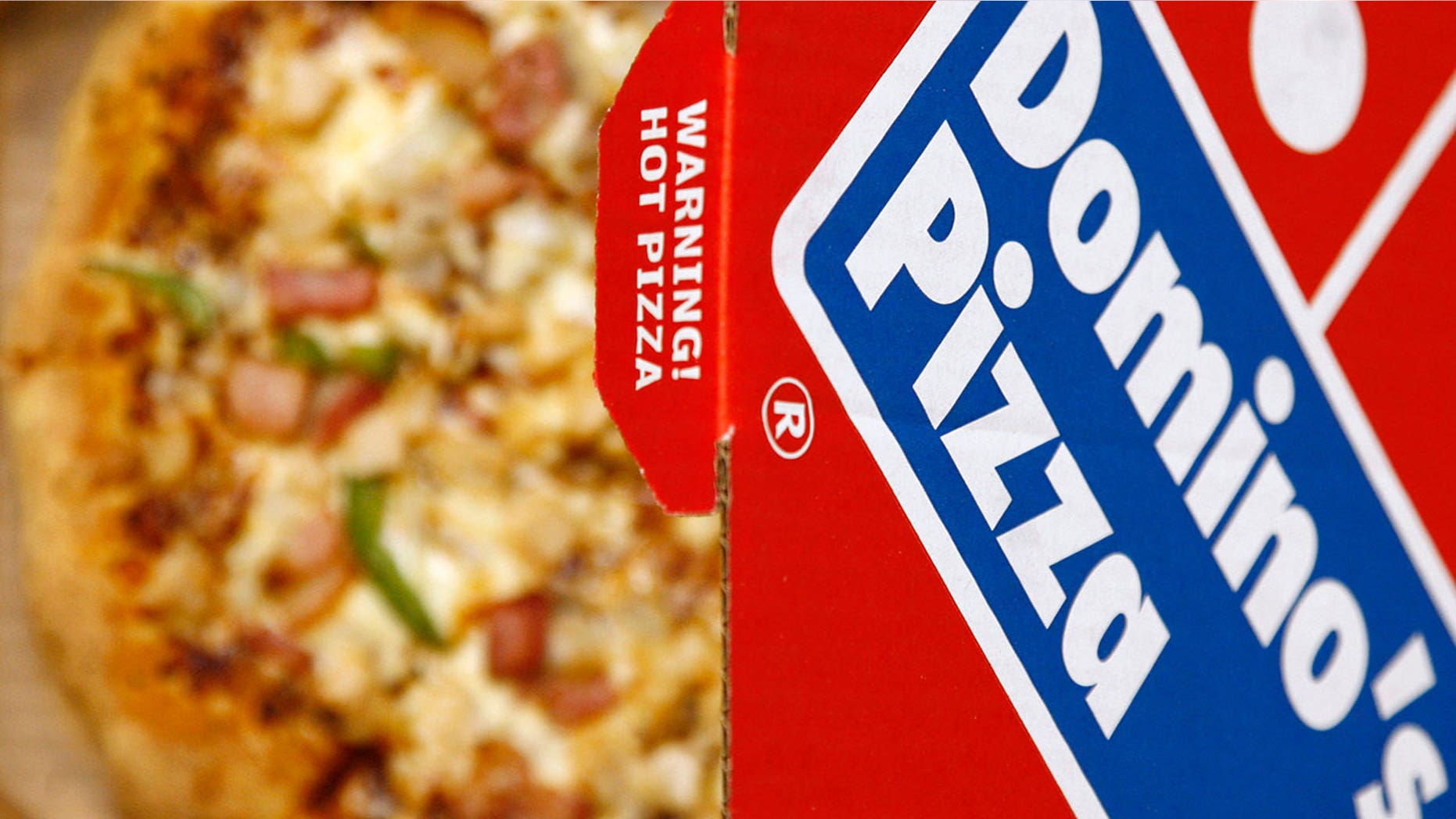 An adult entertainment website says it has developed an interactive sex toy that is capable of ordering Domino's pizza at the push of a button.