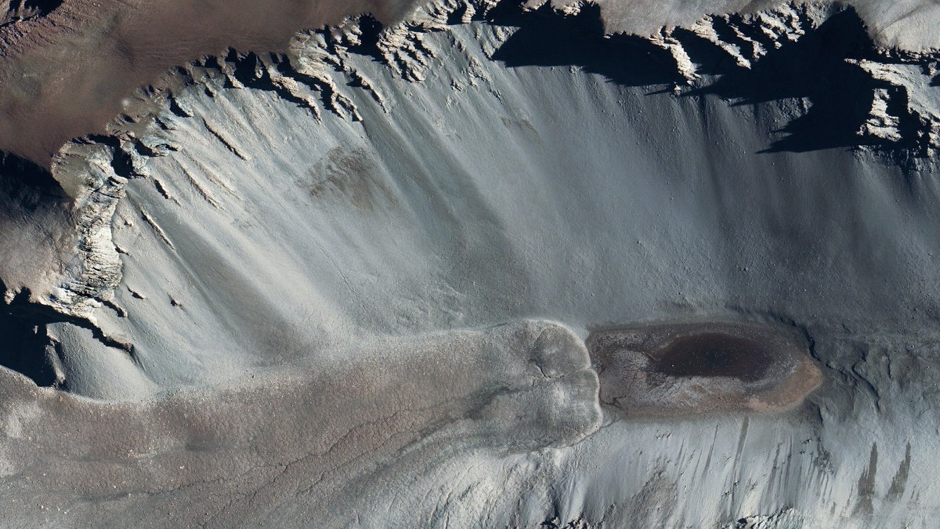 Understanding the hydrology of one of the planet's saltiest bodies of water, Don Juan Pond in Antarctica, could help scientists figure out mysteries about environments on Mars.