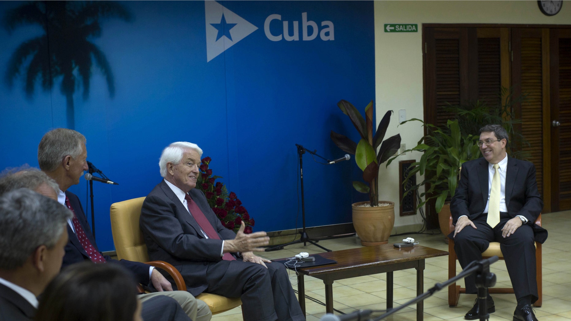 U.S. Chamber of Commerce President and CEO Thomas Donohue, center, accompanied by other members of his delegation talks with Cuba's Foreign Minister Bruno Rodriguez, right, in Havana, Cuba, Tuesday, May 27, 2014. A U.S. Chamber of Commerce Delegation arrived today to Cuba to explore the business climate at the island. (AP Photo/Ramon Espinosa)