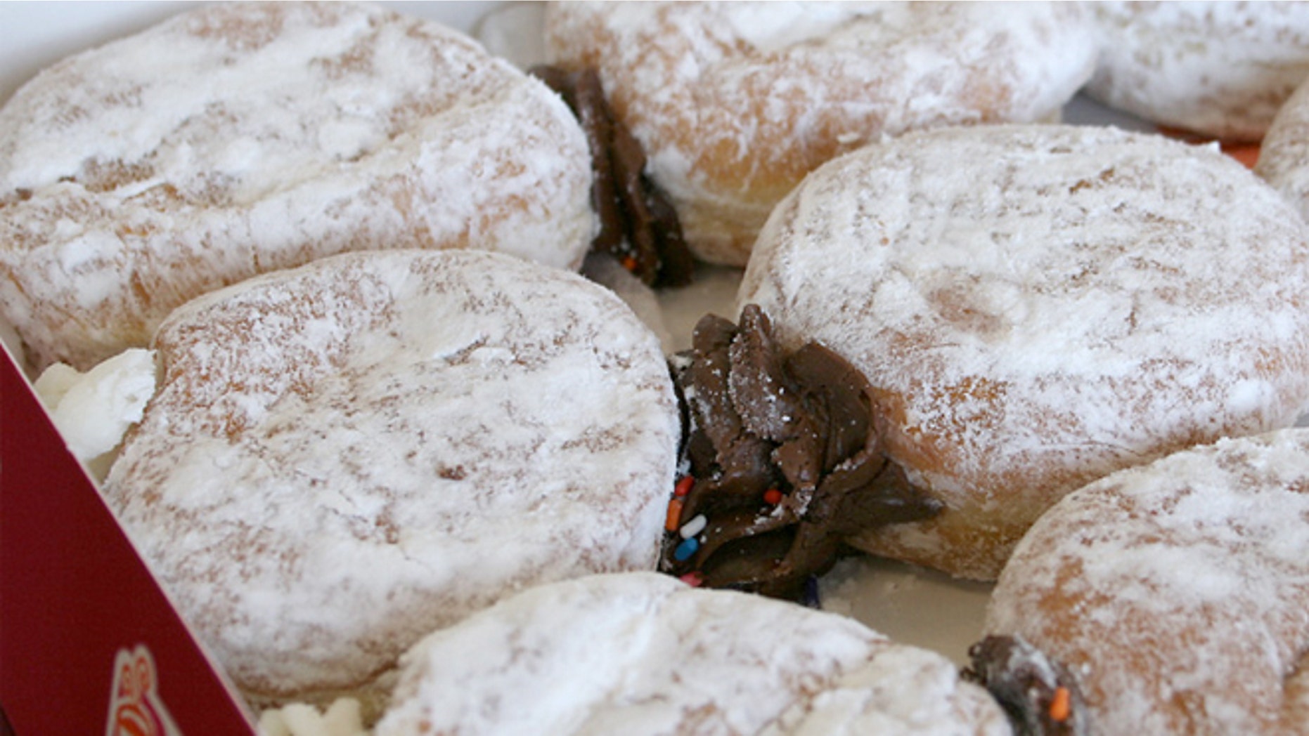 Dunkin' Donuts said Thursday it has agreed to remove titanium dioxide.