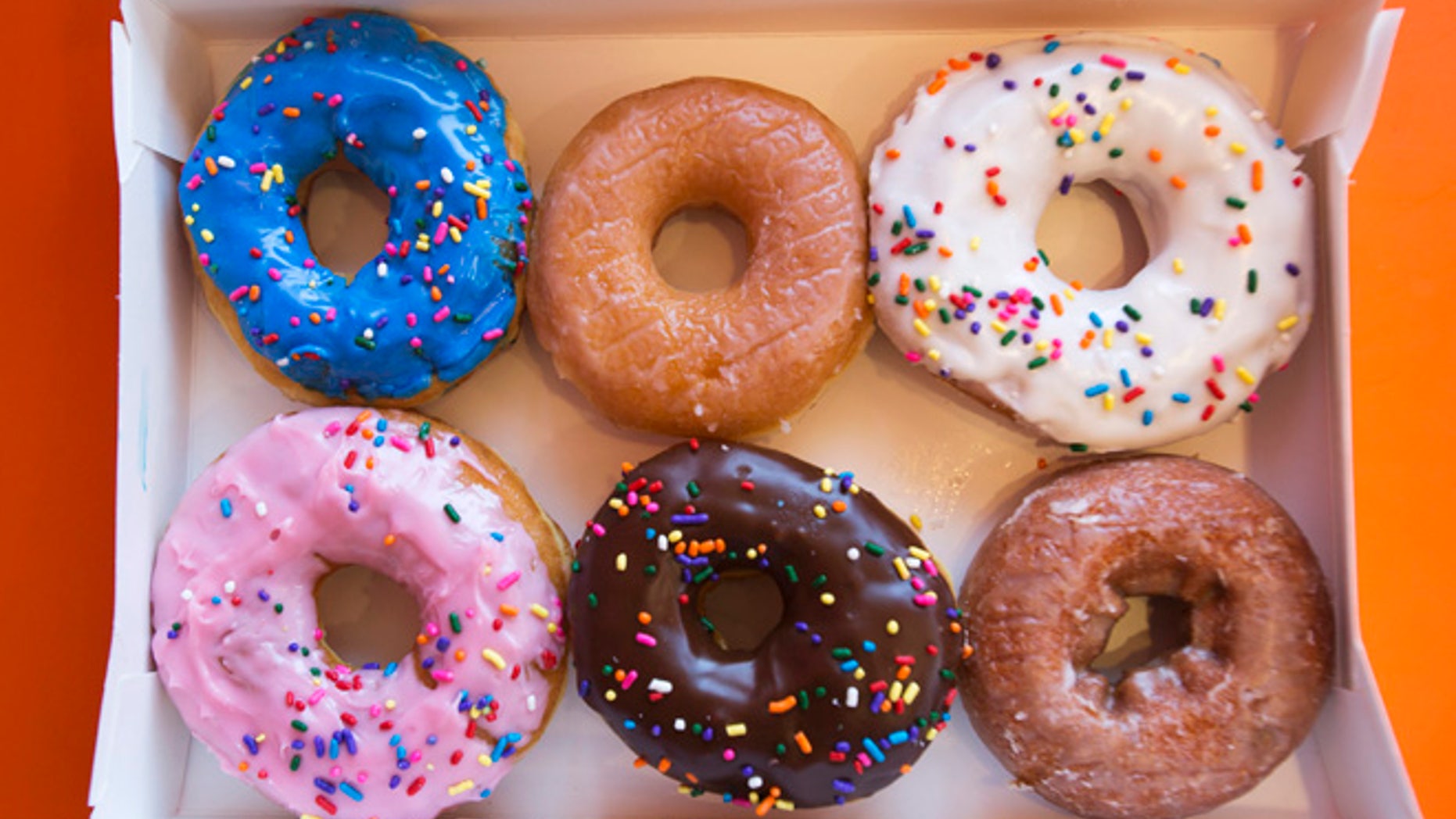 Sept. 2, 2014: A box of donuts, (from top L clockwise) manager's special, traditional glazed, vanilla, pumpkin, chocolate and strawberry, is pictured at a newly opened Dunkin' Donuts store in Santa Monica, California.