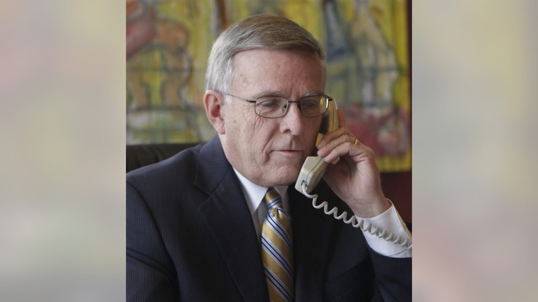 FILE: Sen. Byron Dorgan, D-N.D., talks on the phone in his office on Capitol Hill in Washington on Jan. 6, 2010.
