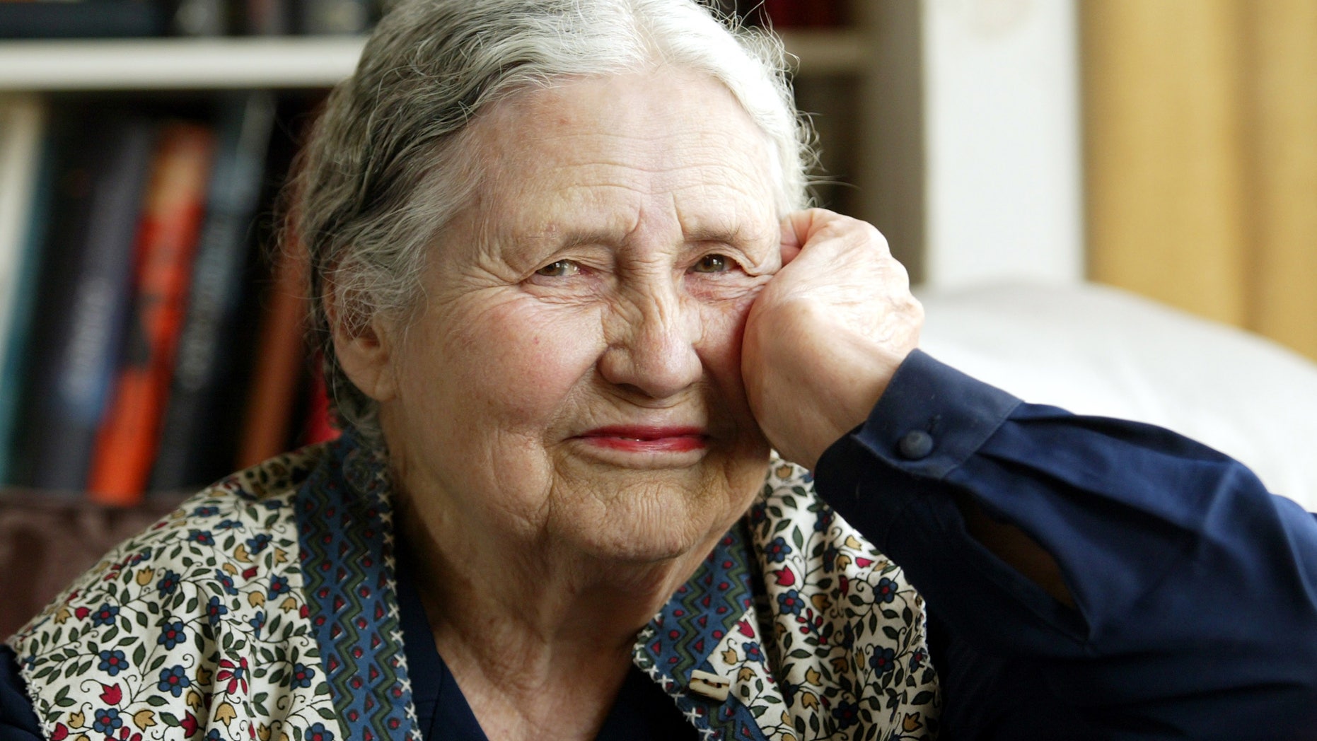 In this April 17, 2006 file photo, Writer Doris Lessing, 86, sits in her home in north London. Lessing, the free-thinking, world-traveling, often-polarizing writer of "The Golden Notebook" and dozens of other novels that reflected her own improbable journey across the former British empire, has died, early Sunday, Nov. 17, 2013. She was 94.